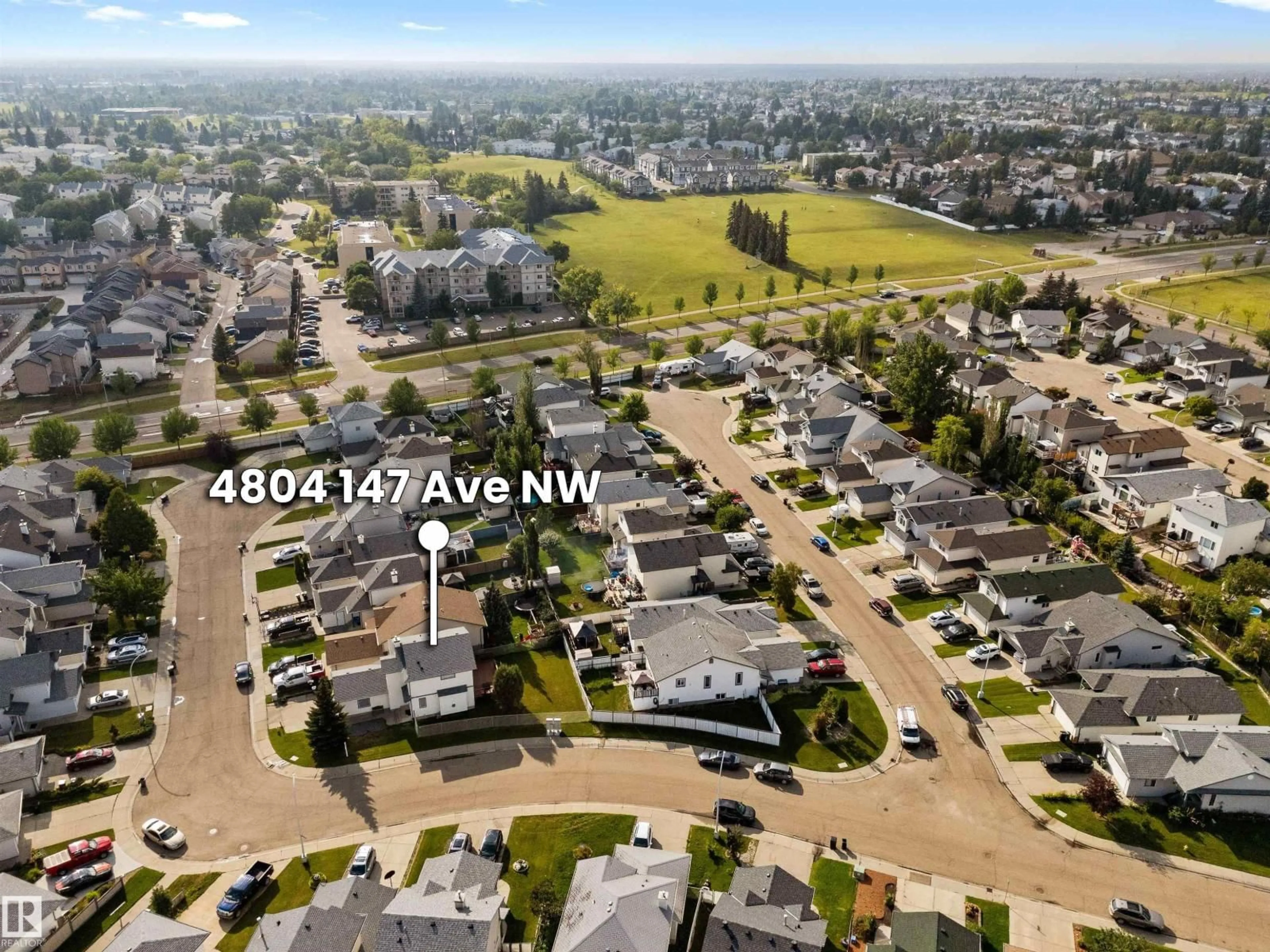 A pic from outside/outdoor area/front of a property/back of a property/a pic from drone, mountain view for NW - 4804 147 AV, Edmonton Alberta T5Y2X2