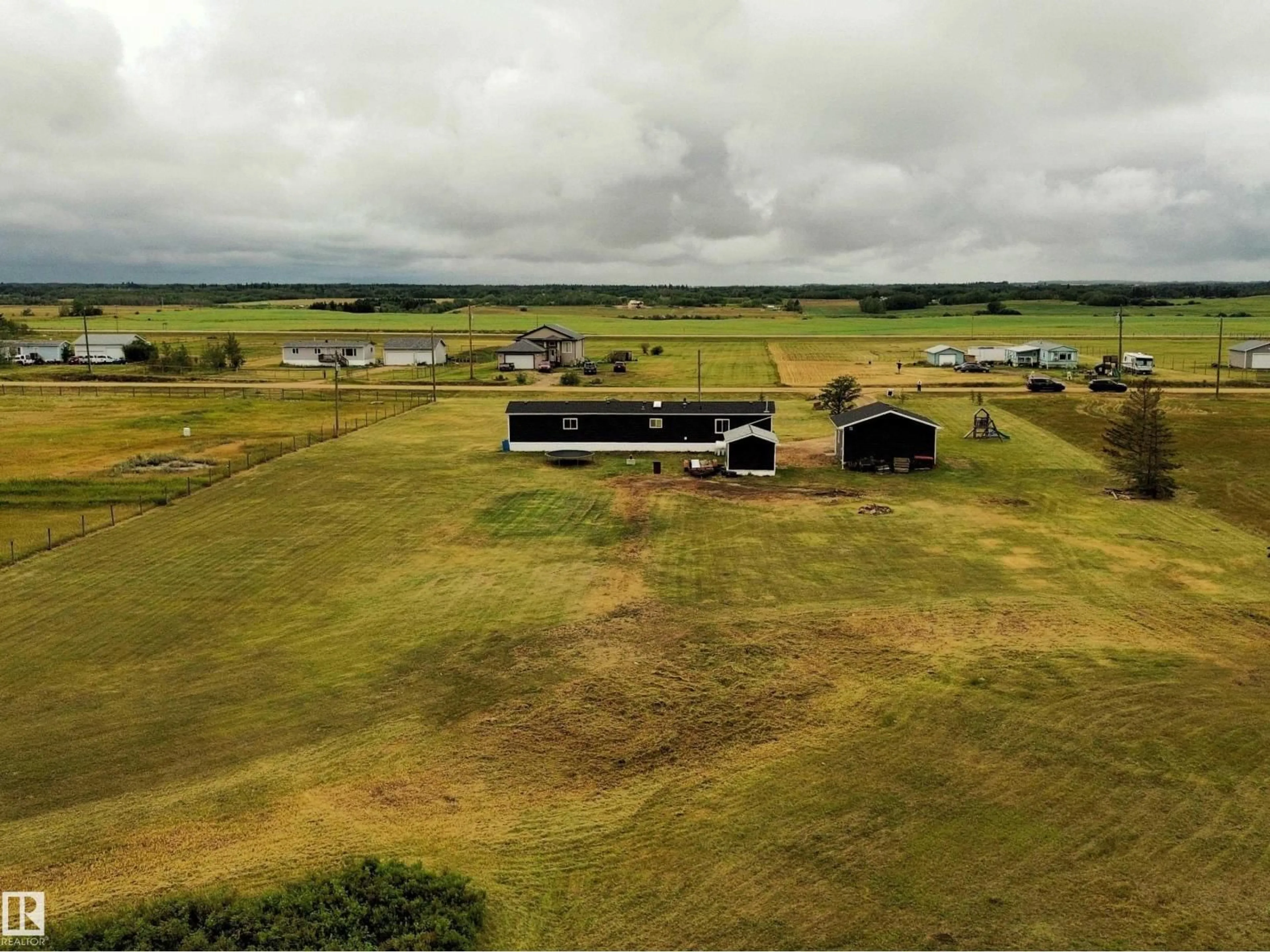 A pic from outside/outdoor area/front of a property/back of a property/a pic from drone, building for 42 RICHFIELD RD, Rural Sturgeon County Alberta T0G1L2