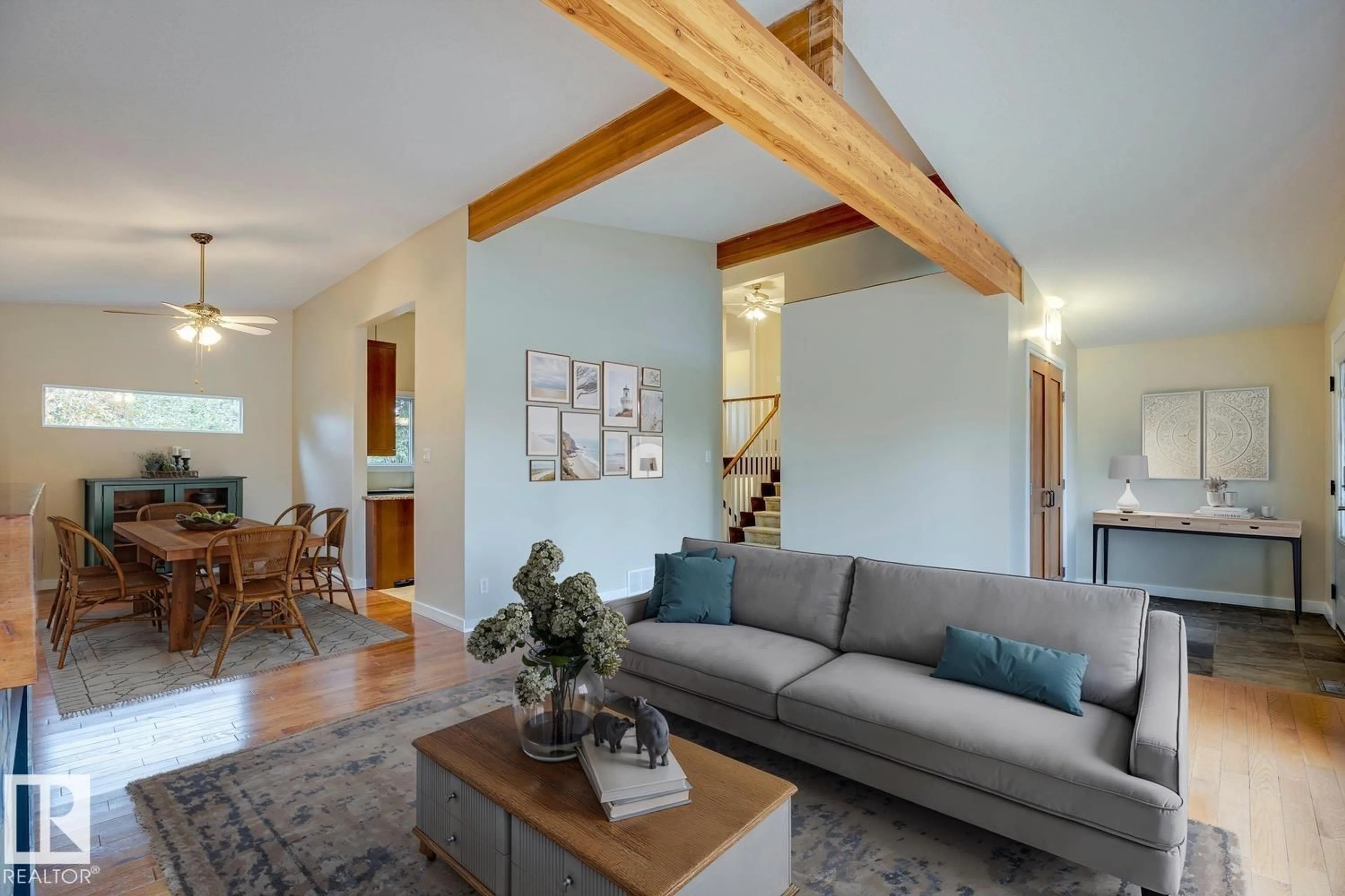 Living room with furniture, wood/laminate floor for 15426 74 AV, Edmonton Alberta T5R2Y4