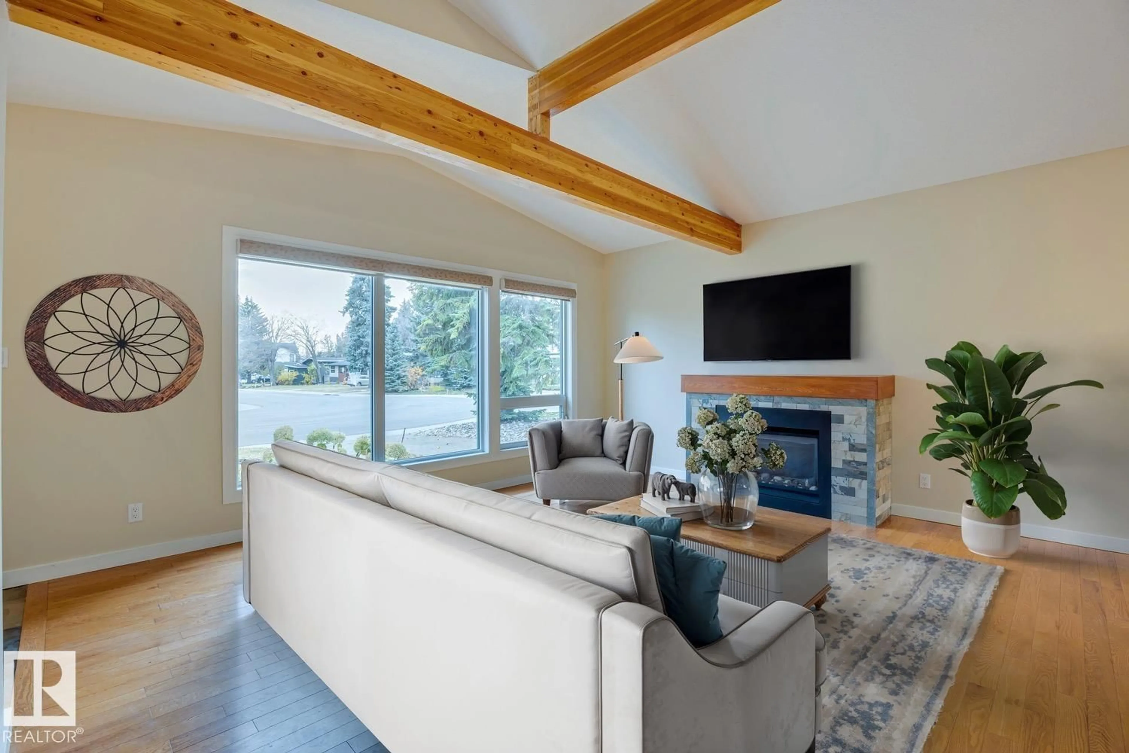 Living room with furniture, wood/laminate floor for 15426 74 AV, Edmonton Alberta T5R2Y4