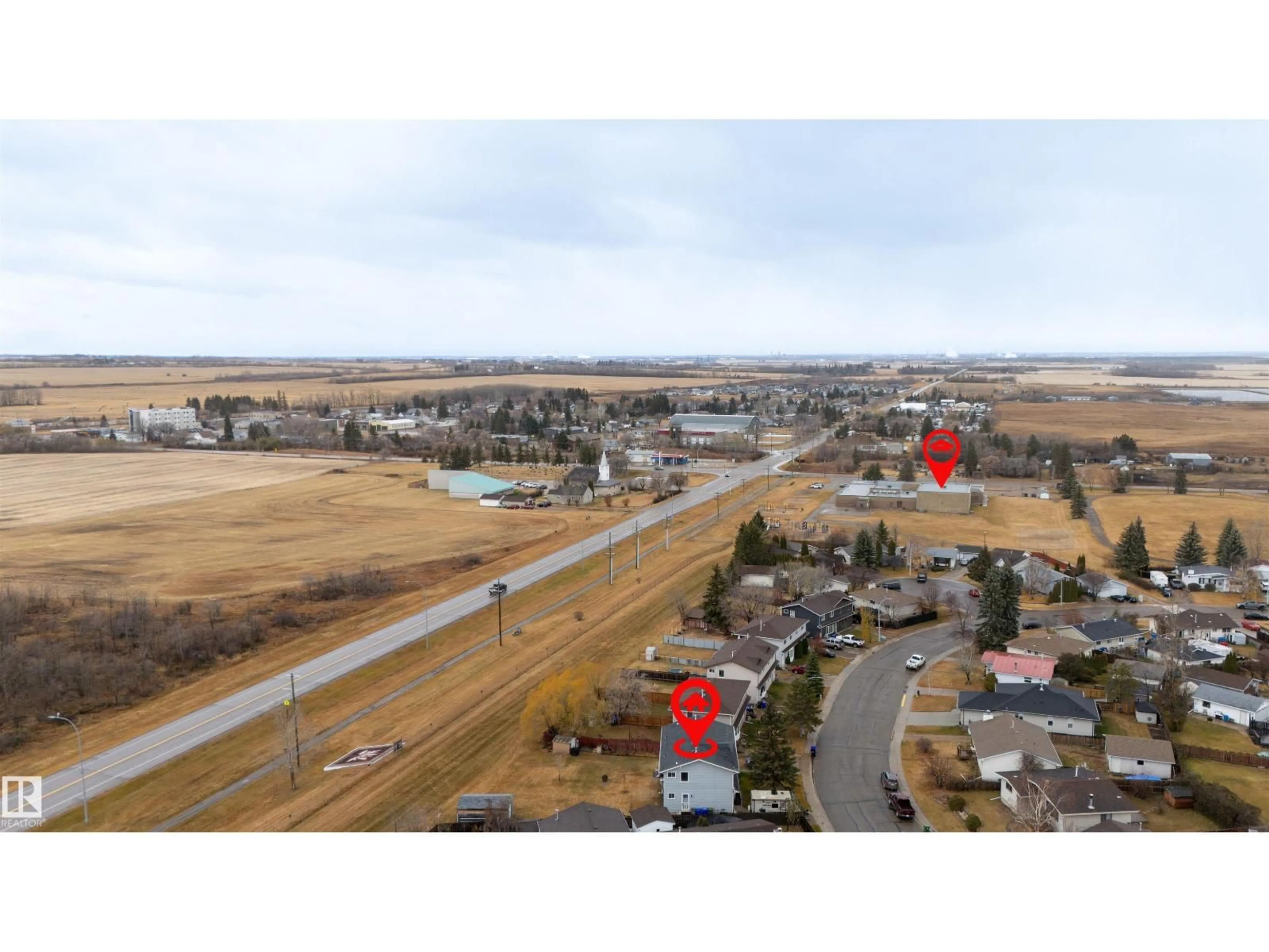 A pic from outside/outdoor area/front of a property/back of a property/a pic from drone, street for 4629 53 AV, Bruderheim Alberta T0B0S0