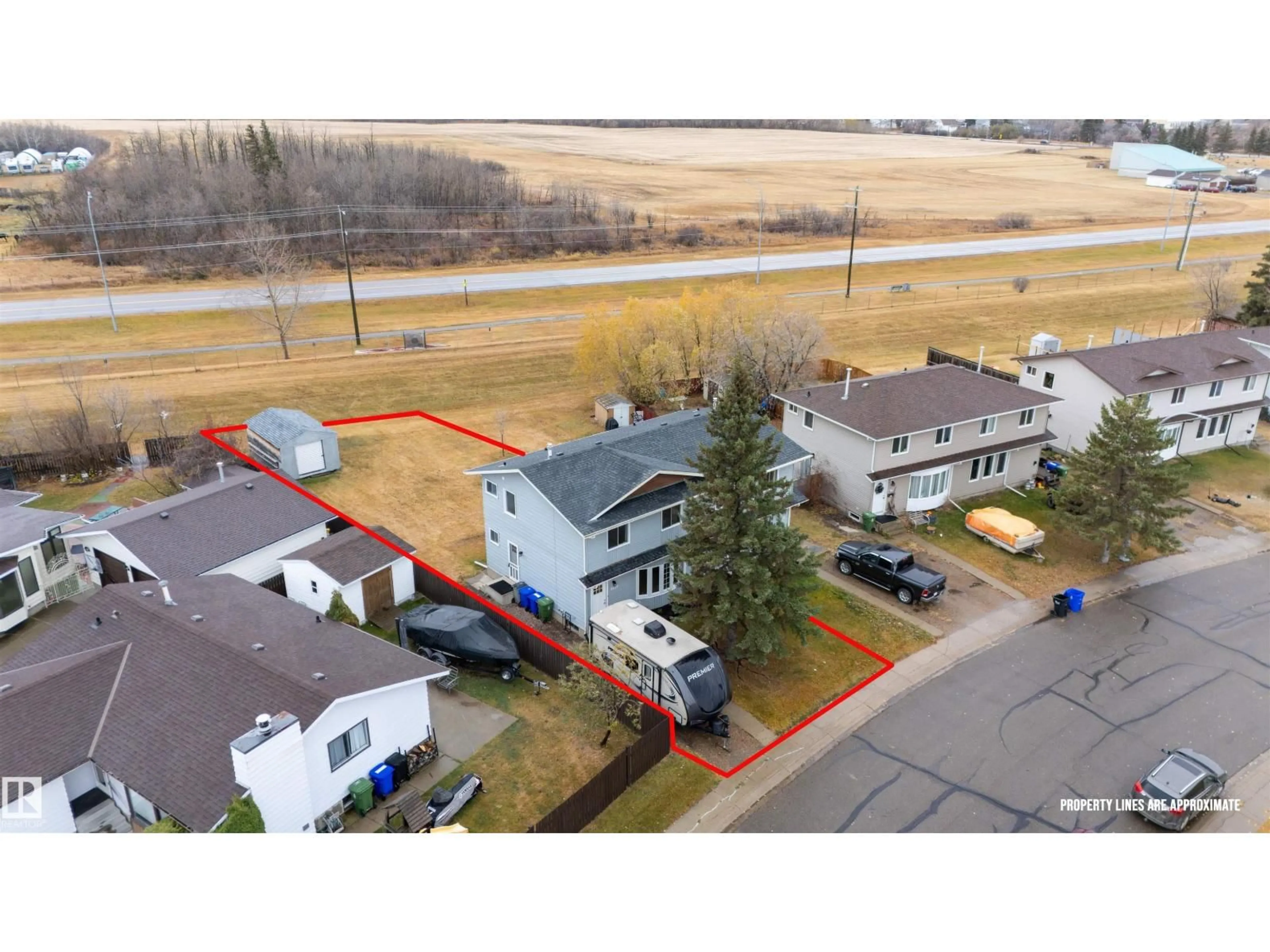 A pic from outside/outdoor area/front of a property/back of a property/a pic from drone, street for 4629 53 AV, Bruderheim Alberta T0B0S0