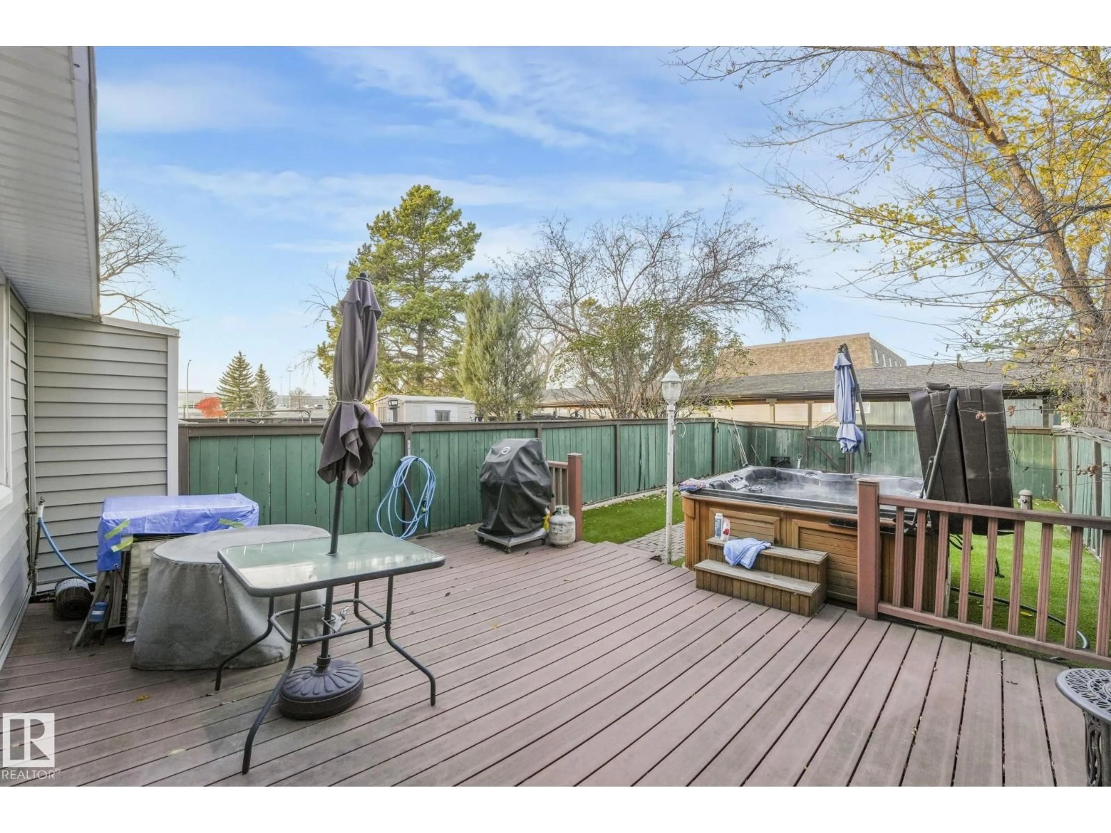 Patio, water/lake/river/ocean view for 121 VILLAGE ON THE GREEN GR, Edmonton Alberta T5A1H2