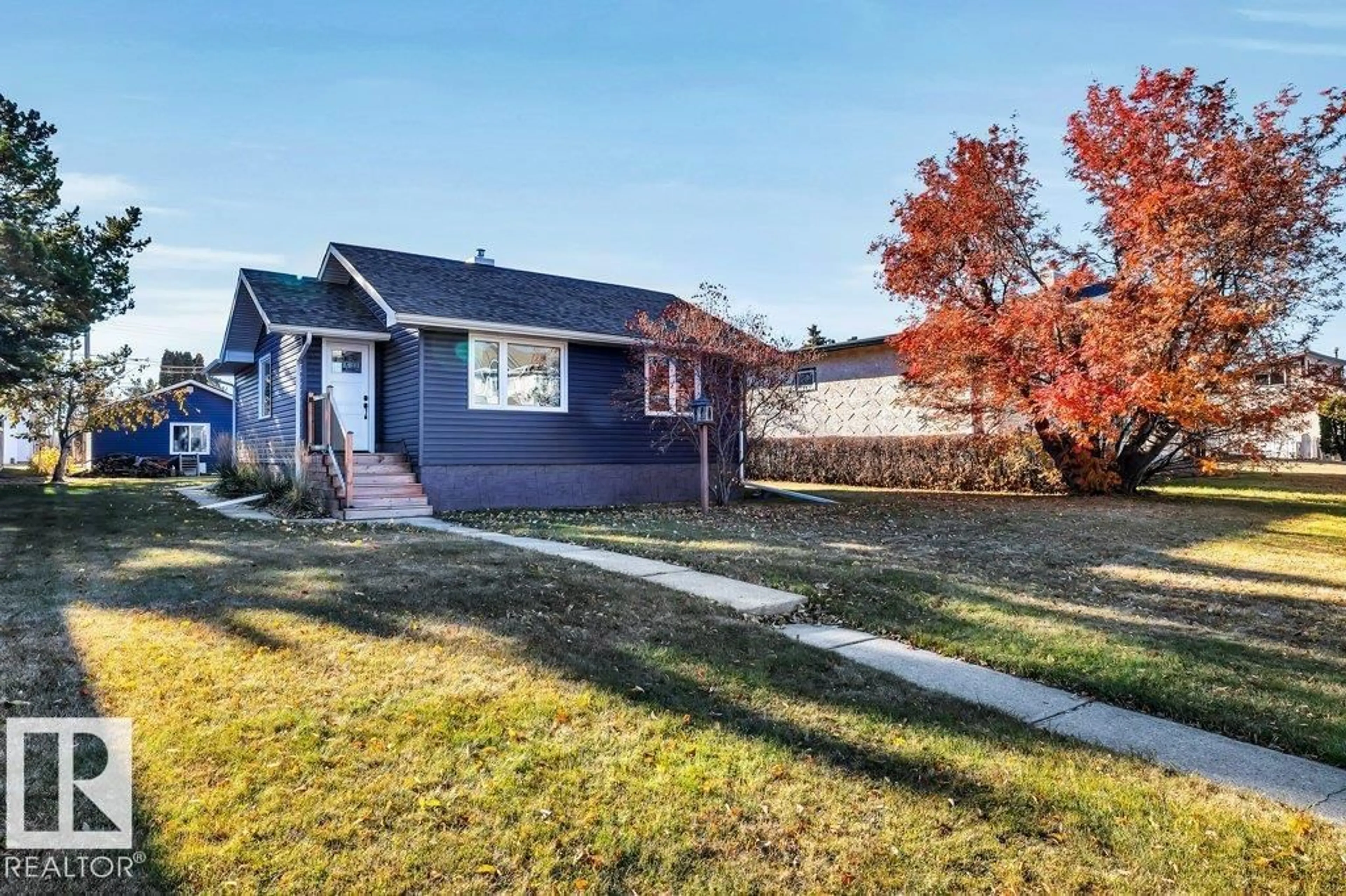 A pic from outside/outdoor area/front of a property/back of a property/a pic from drone, street for 15 KOOTENAY AV, Devon Alberta T9G1J2