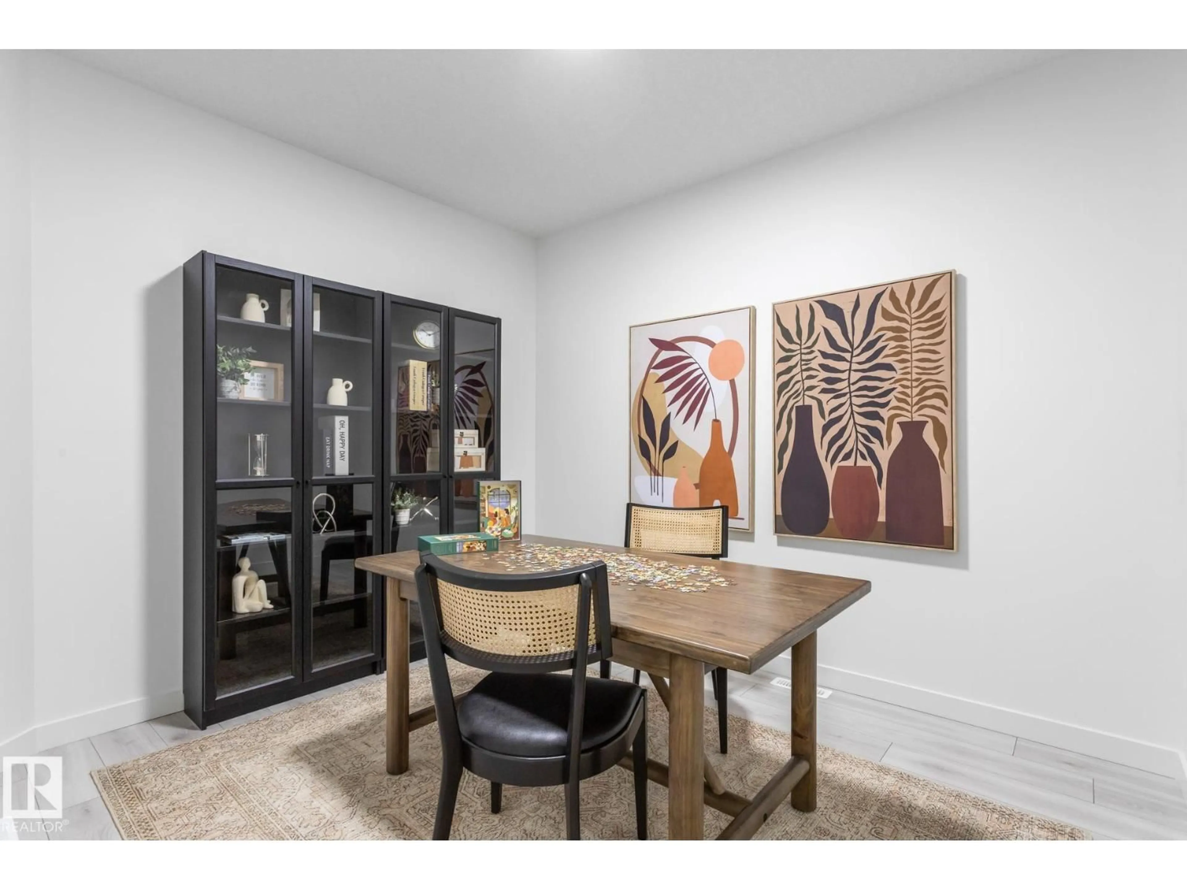 Dining room, wood/laminate floor for NE - 319 157 AV, Edmonton Alberta T5K6K8