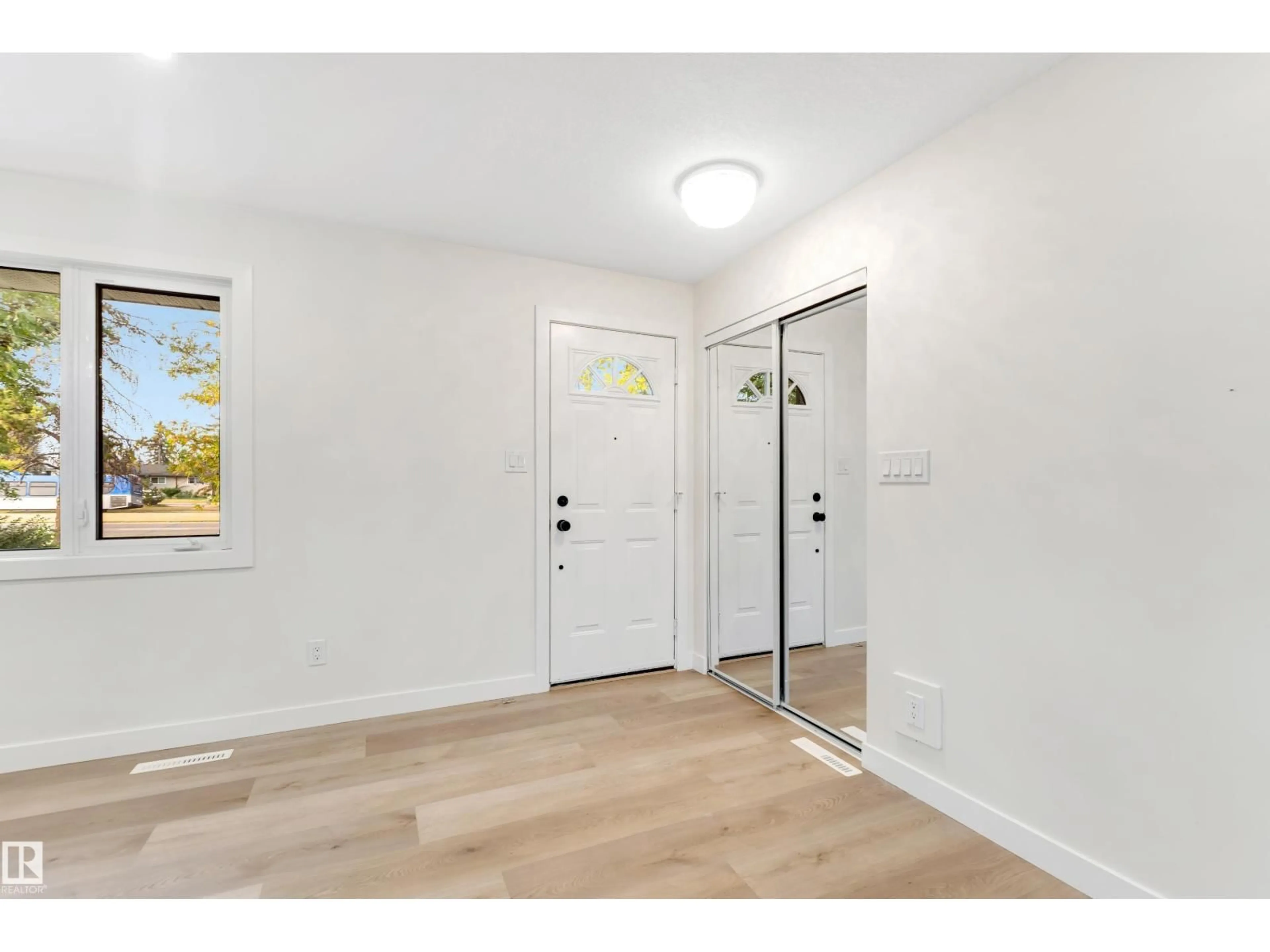 Indoor entryway for 5907 137 AV, Edmonton Alberta T5A0P1