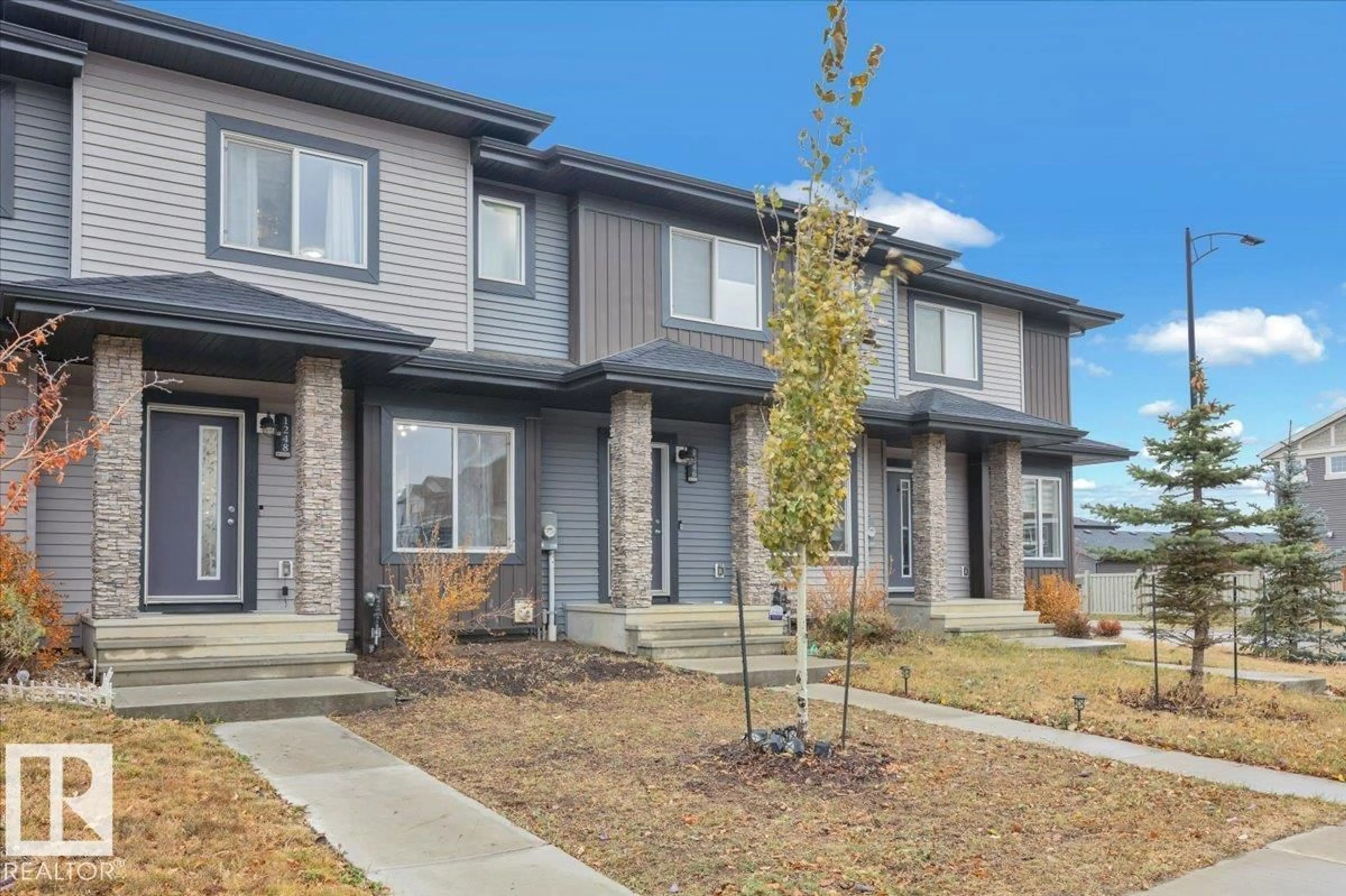 Home with brick exterior material, street for 1248 ROSENTHAL BV, Edmonton Alberta T5T7N6