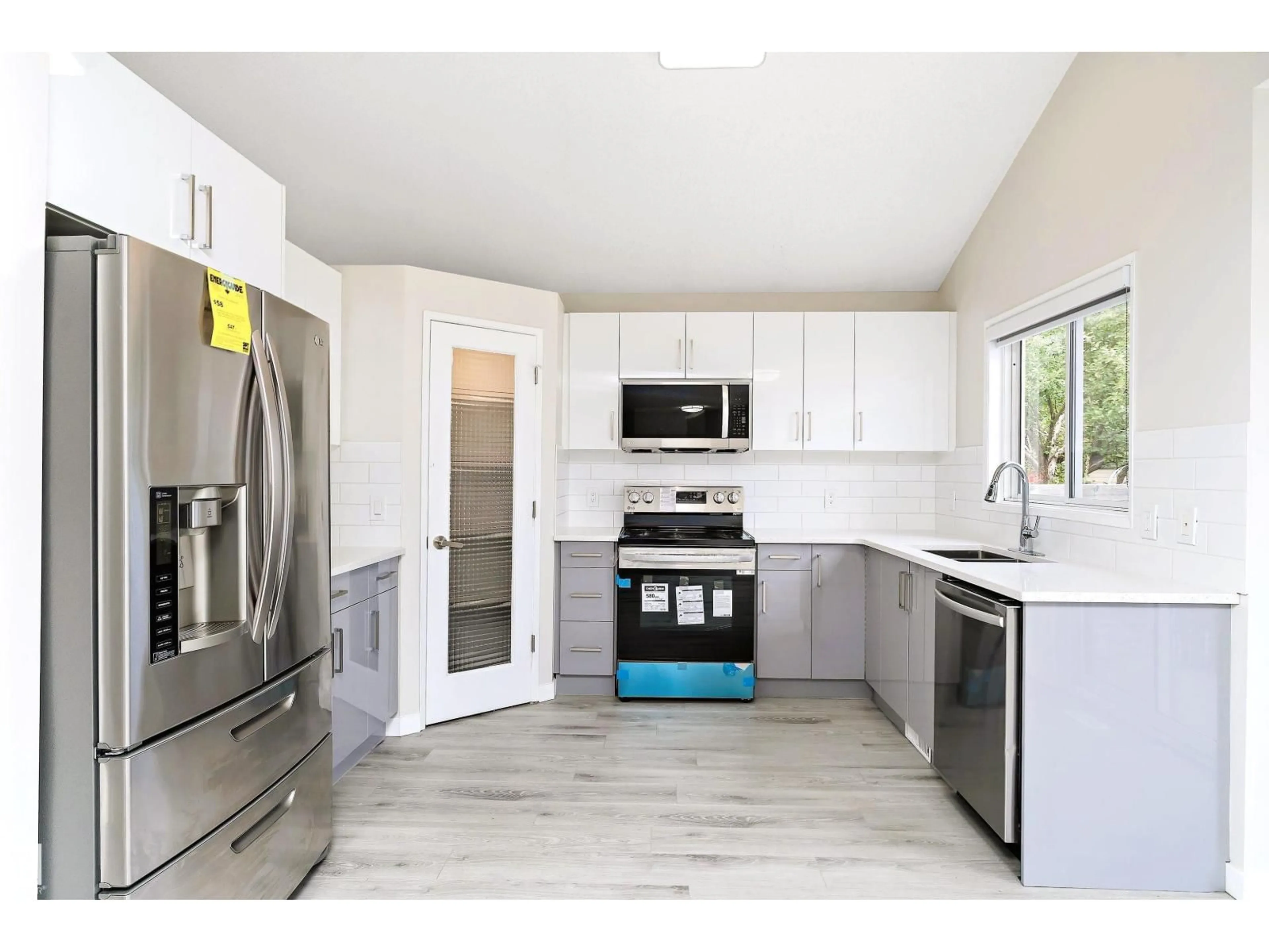 Open concept kitchen, unknown for NW - 12828 144 AV, Edmonton Alberta T6V1C7