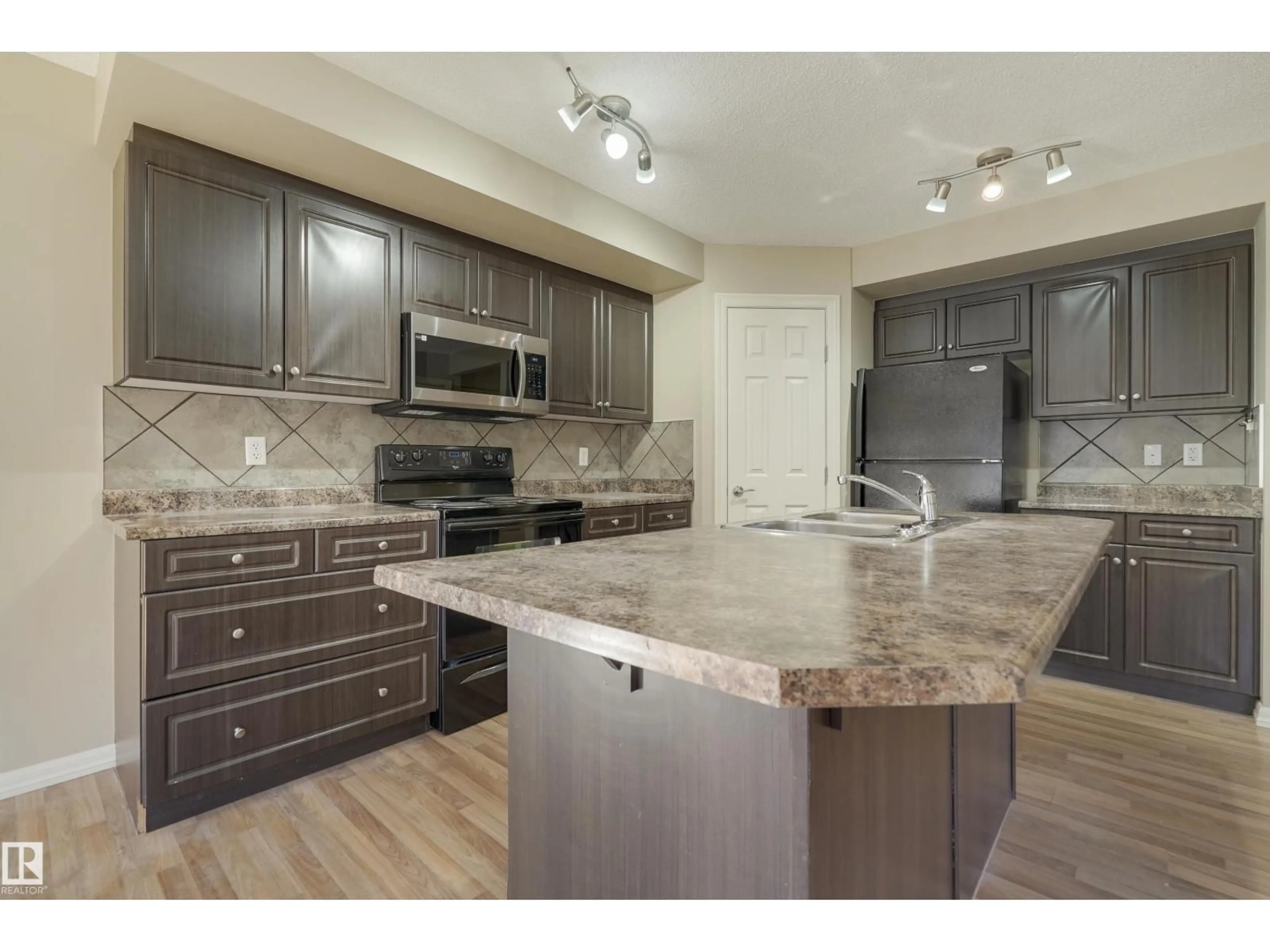Open concept kitchen, ceramic/tile floor for 1323 CUNNINGHAM DR, Edmonton Alberta T6W1R8
