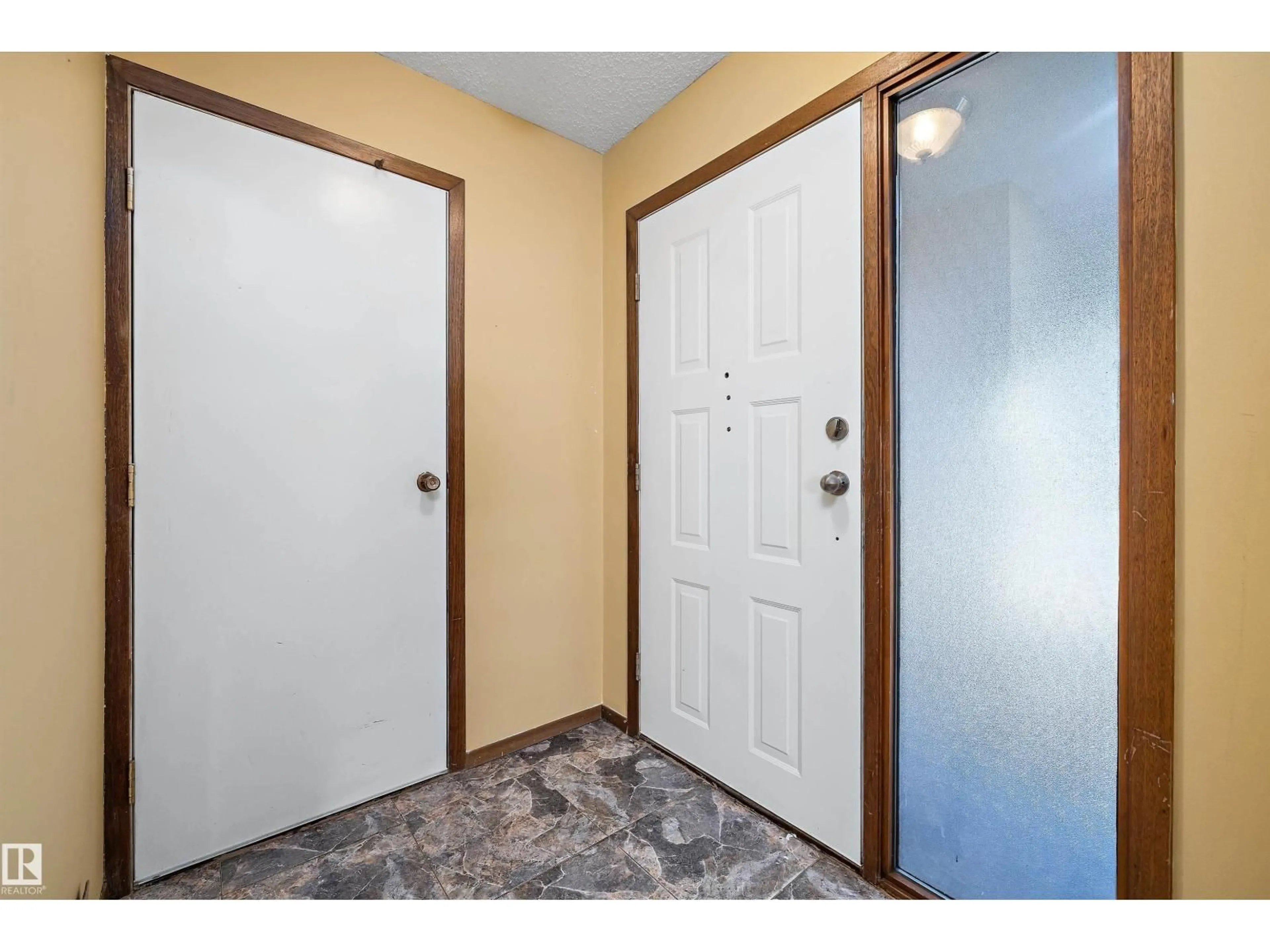 Indoor entryway for 2031 104A ST, Edmonton Alberta T6J5A6