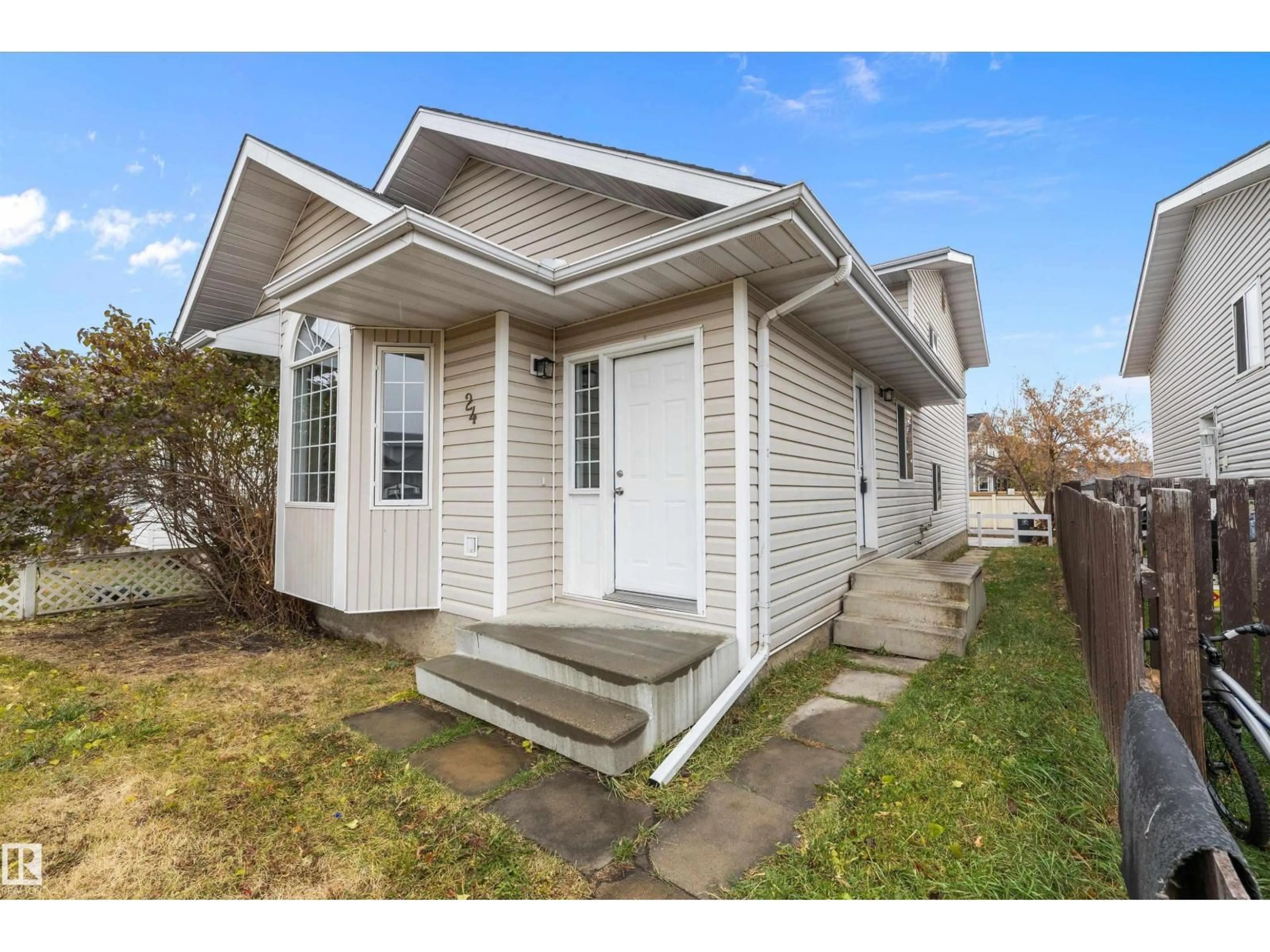 Home with vinyl exterior material, street for 24 GOLD EYE DR, Devon Alberta T9G1V9