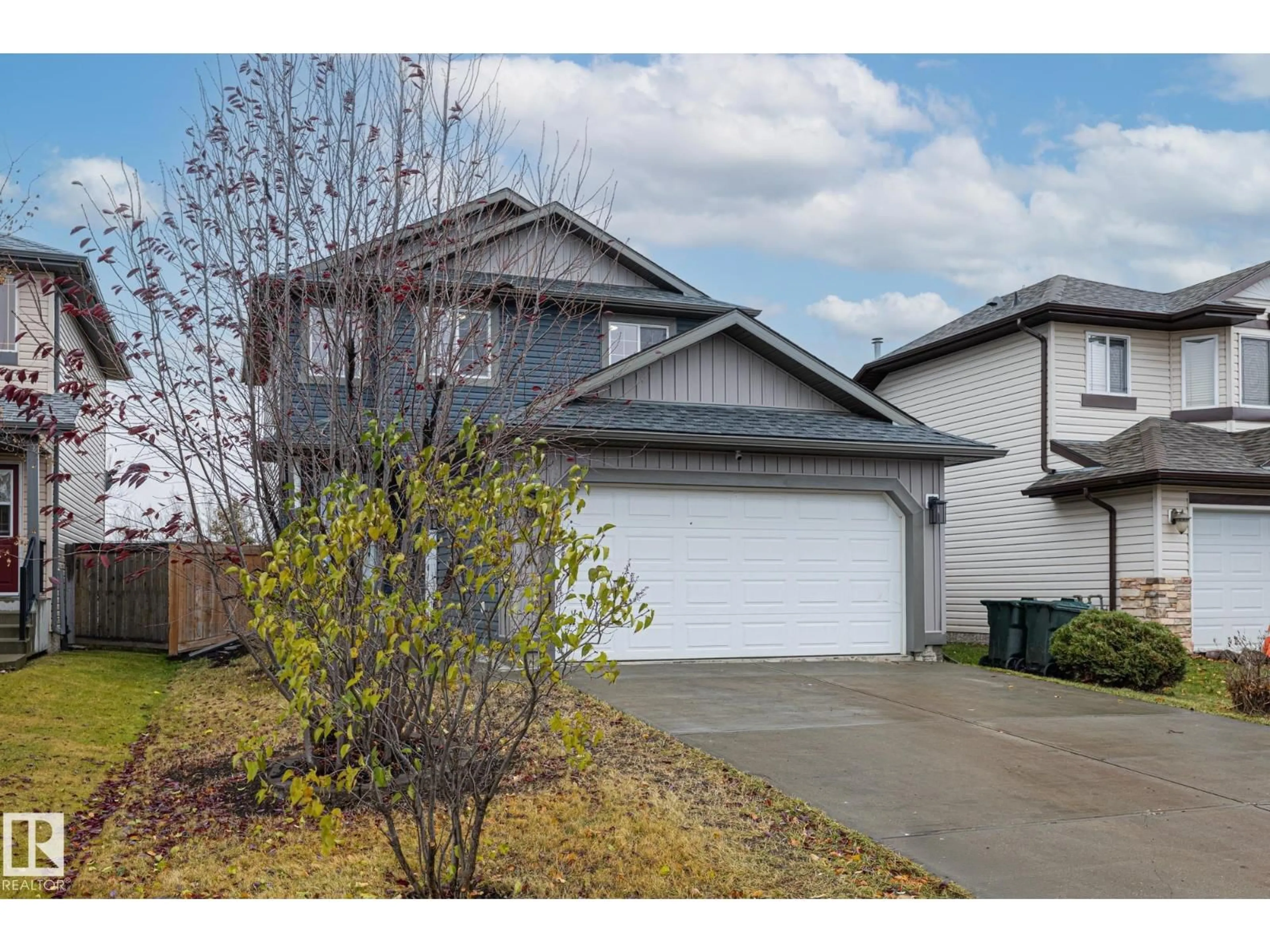 Home with vinyl exterior material, street for 19 HEATHERLANDS WY, Spruce Grove Alberta T7X4L3