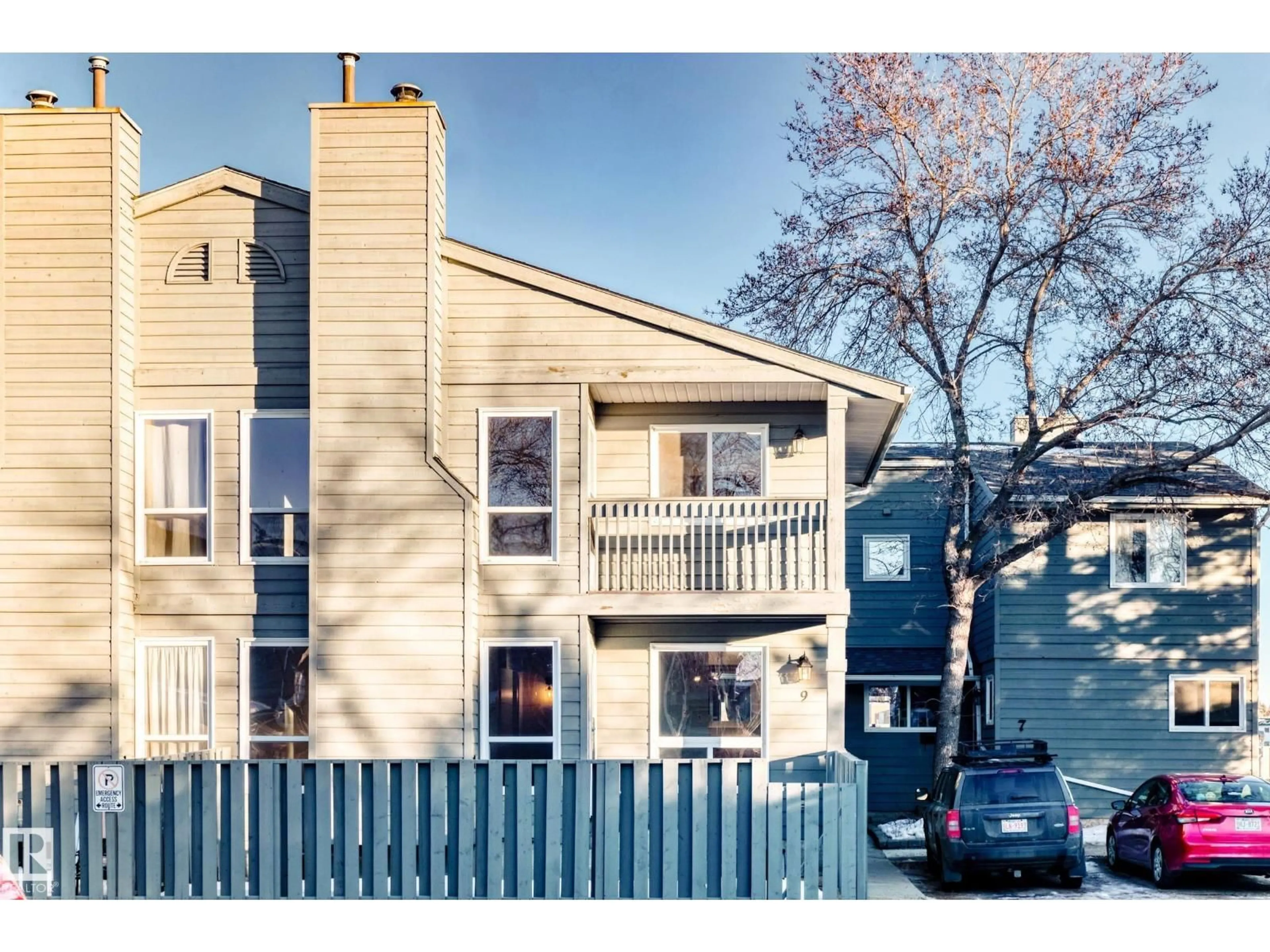 Home with vinyl exterior material, street for 9 - 4610 17 AV NW, Edmonton Alberta T6L5T1