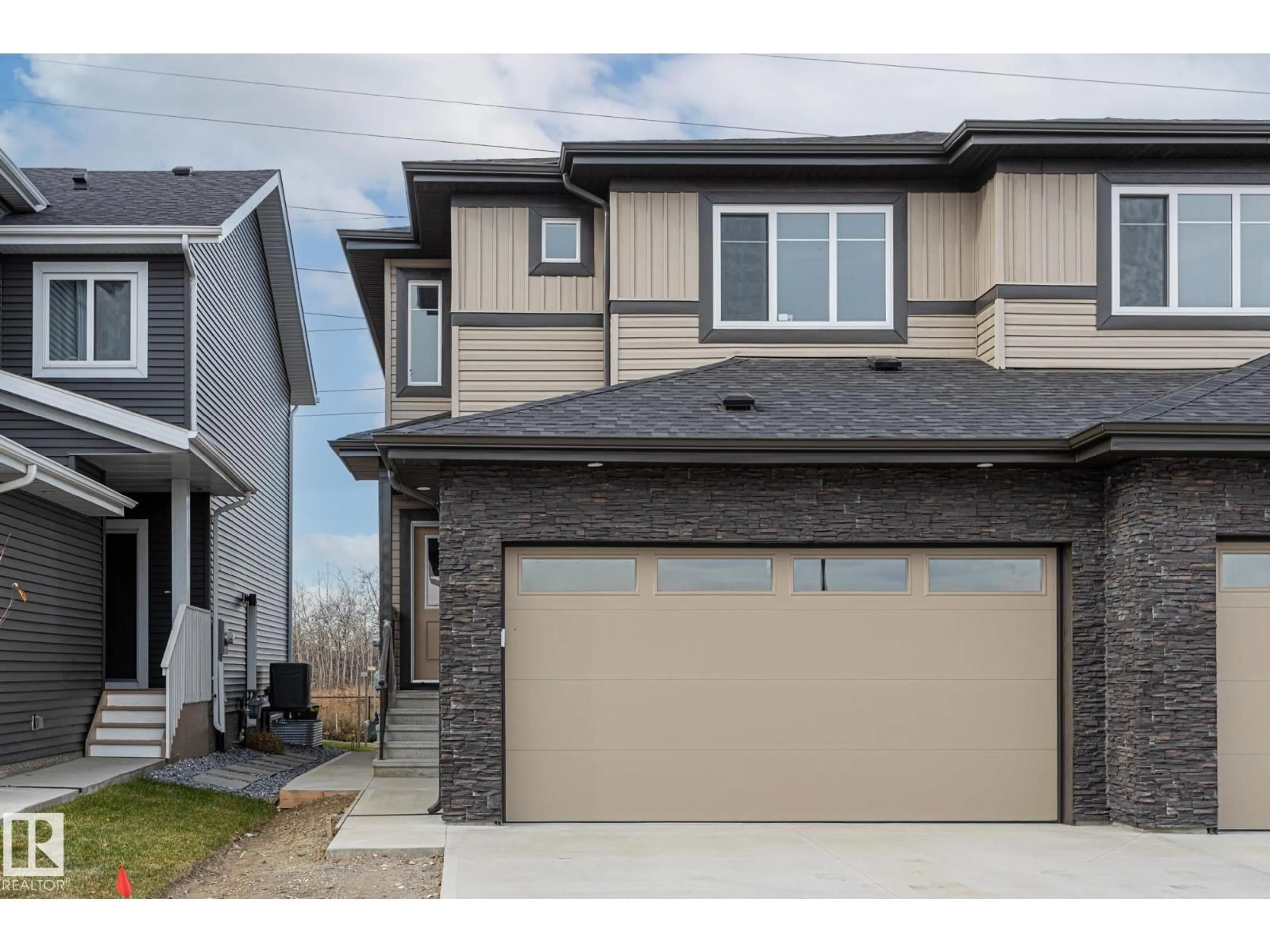 Home with vinyl exterior material, street for 66 WAVERLY WAY, Fort Saskatchewan Alberta T8L0Z8
