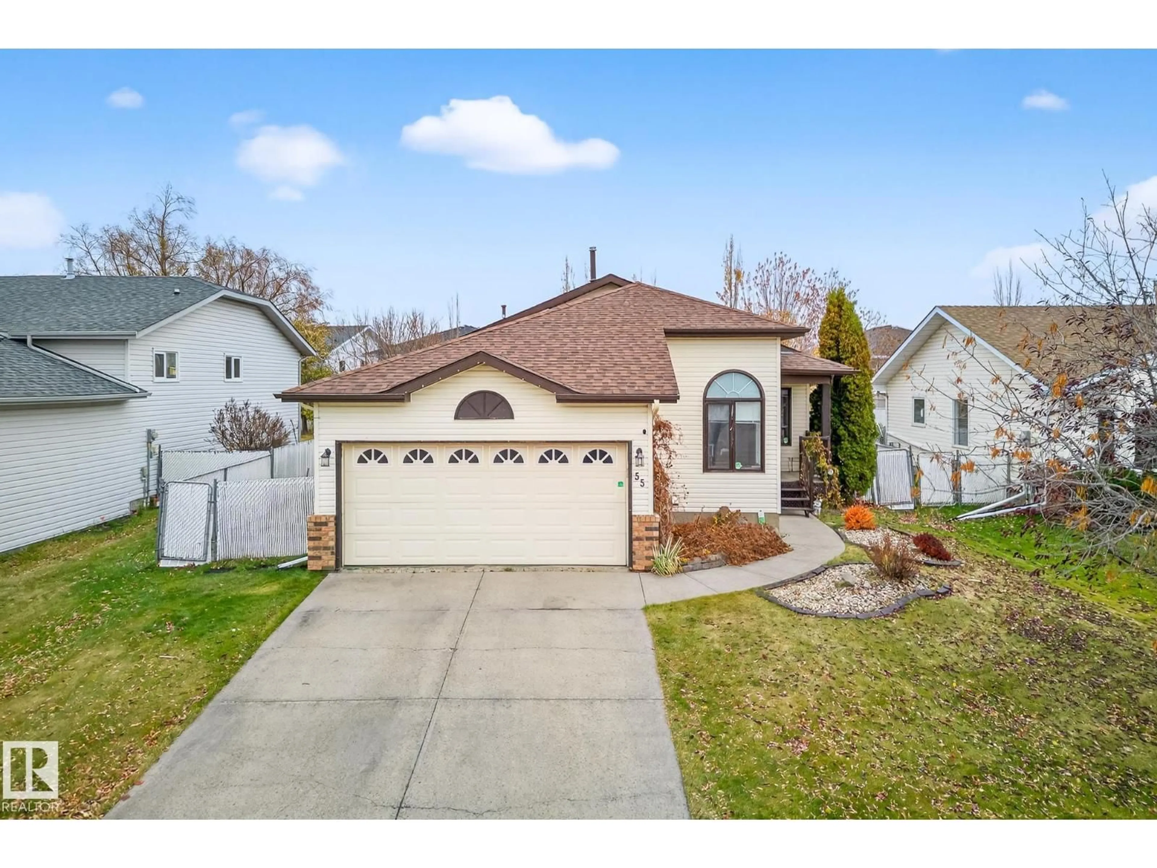 Home with vinyl exterior material, street for 55 MCLEOD CR, Leduc Alberta T9E6N9