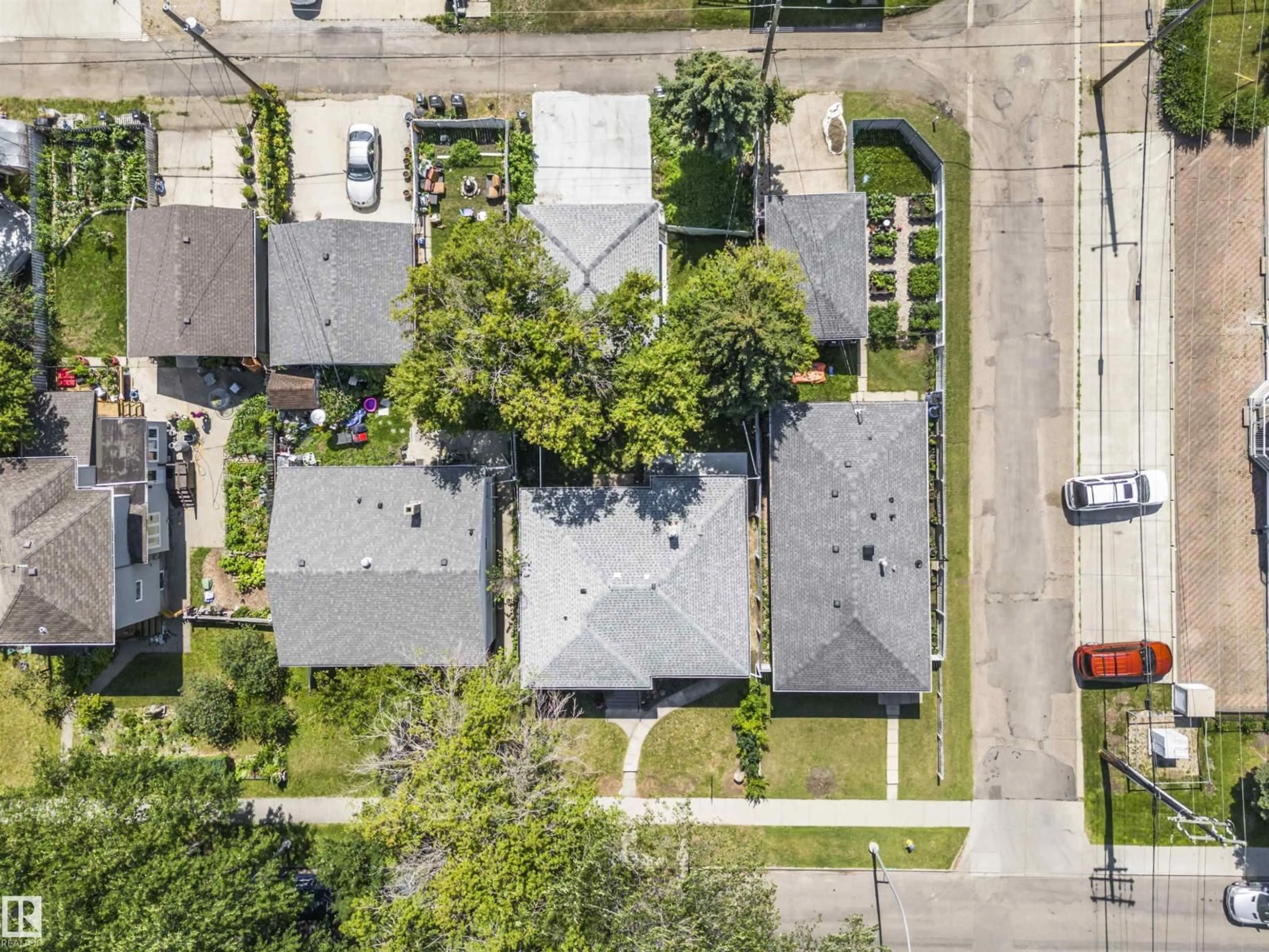 A pic from outside/outdoor area/front of a property/back of a property/a pic from drone, street for 8125 84 AV, Edmonton Alberta T6C1C7