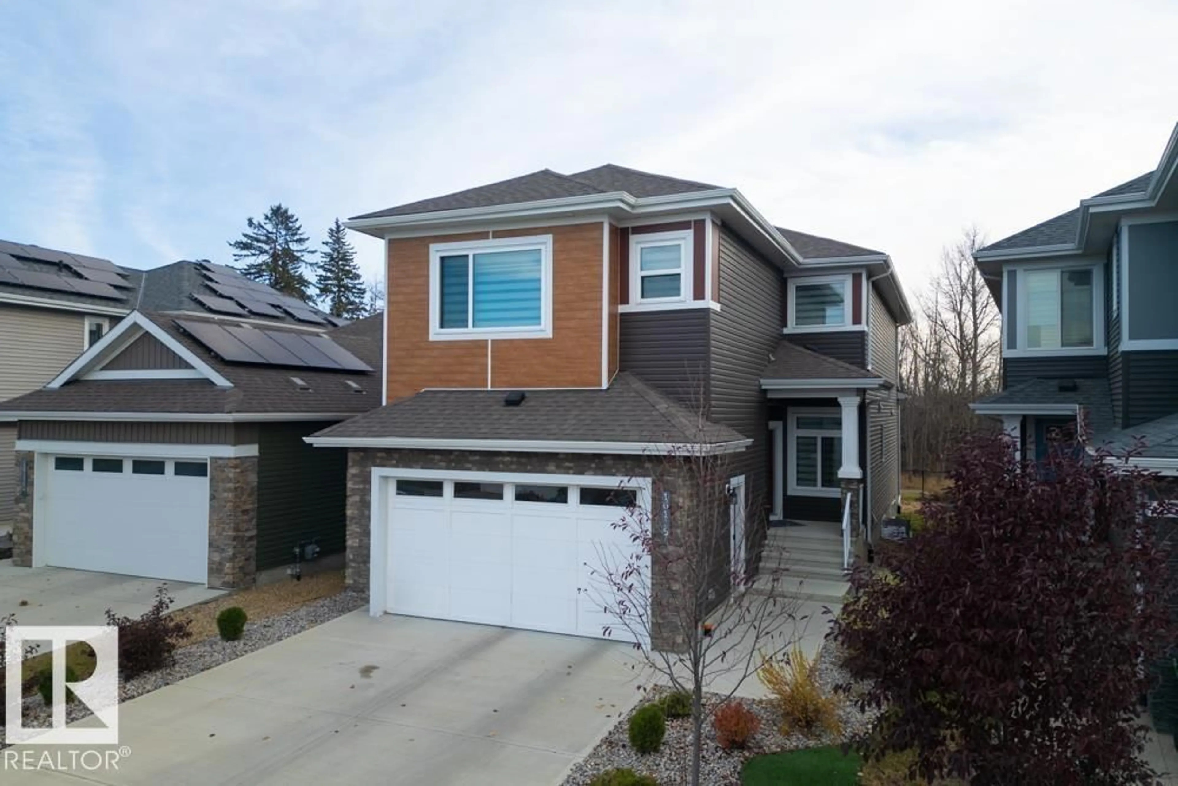 Home with vinyl exterior material, street for 16115 34 AV, Edmonton Alberta T6W4V7