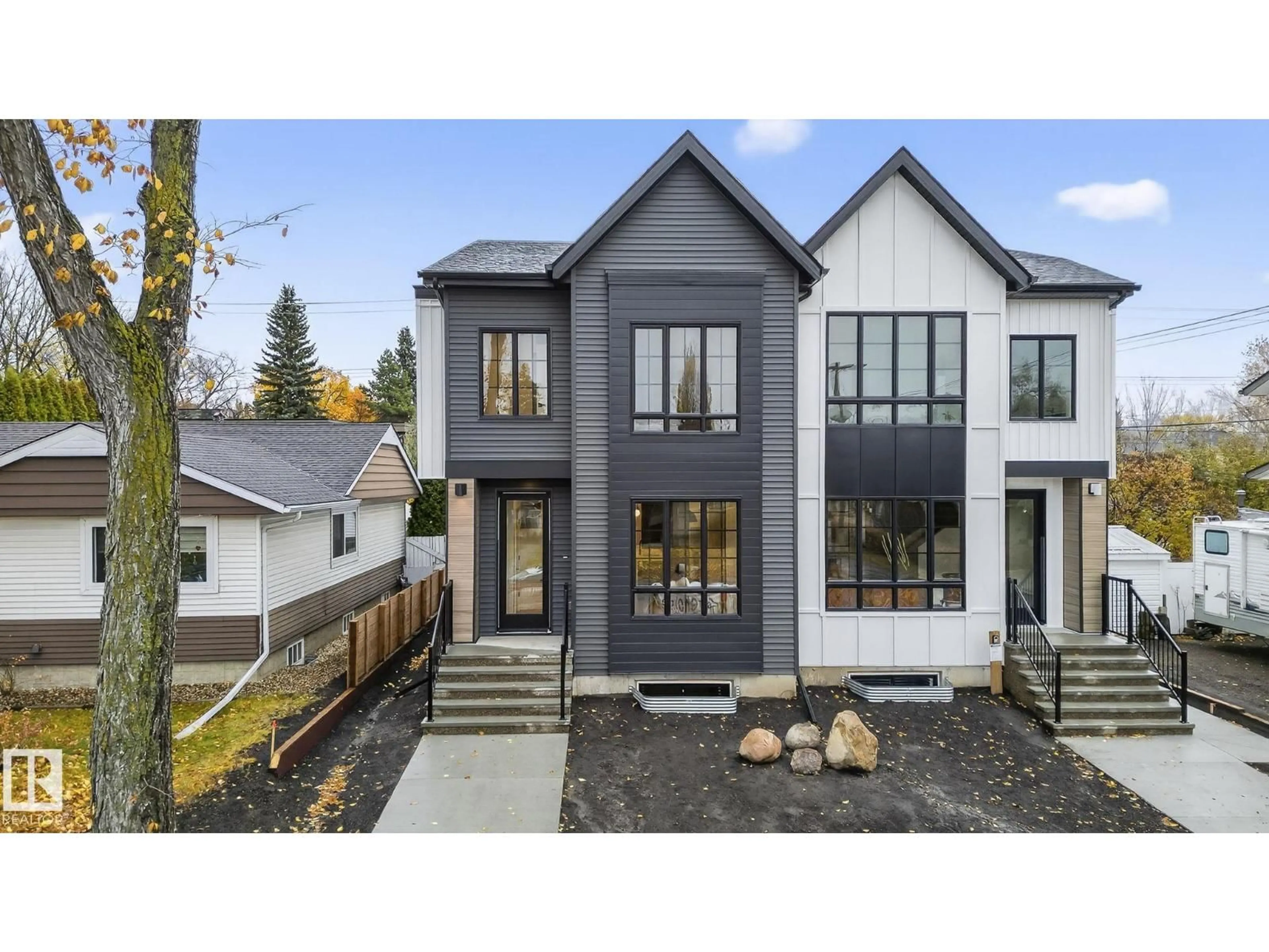 Home with brick exterior material, street for 7711 95 AV, Edmonton Alberta T6C1X8