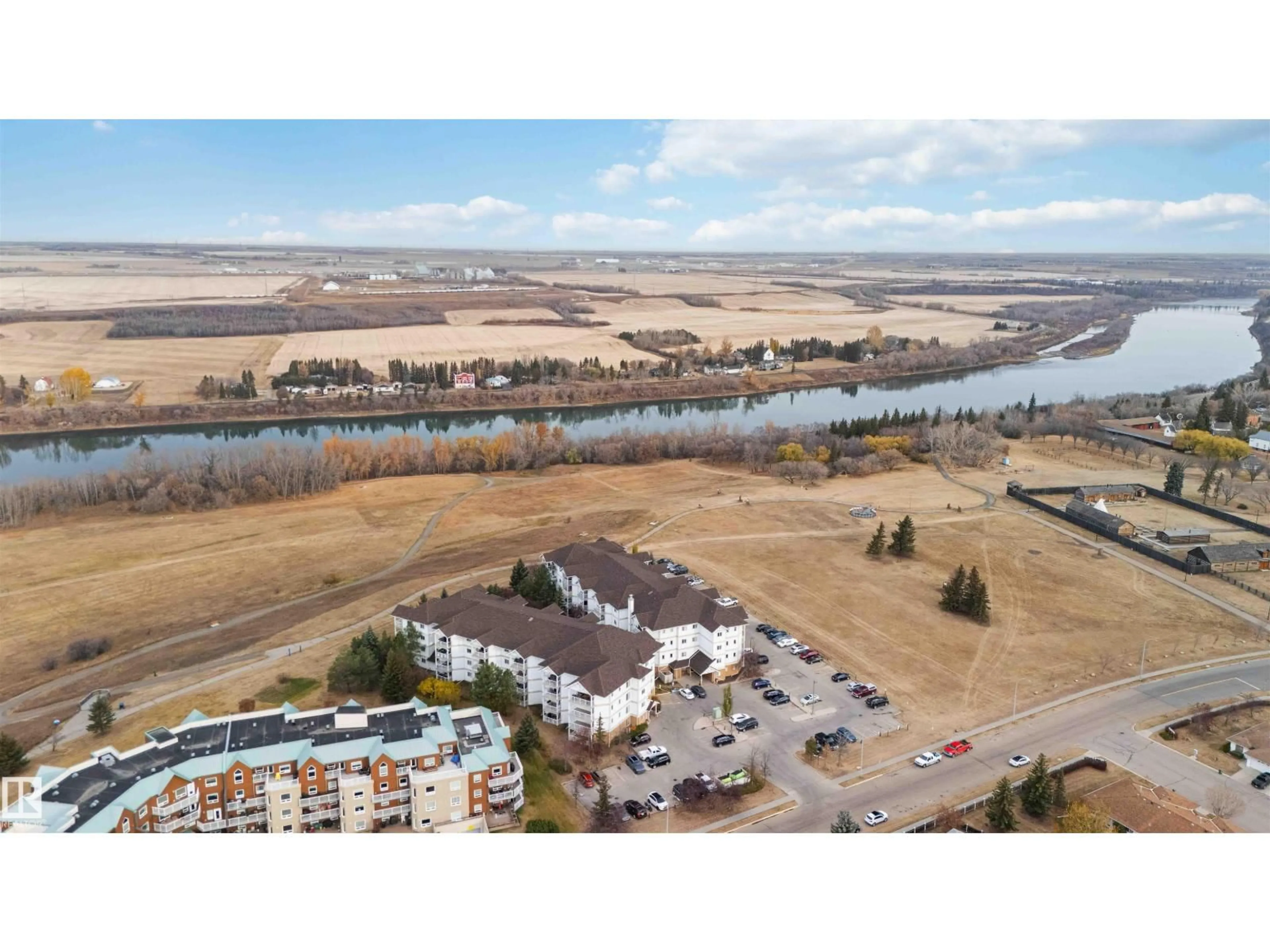 A pic from outside/outdoor area/front of a property/back of a property/a pic from drone, water/lake/river/ocean view for 105 - 9930 100, Fort Saskatchewan Alberta T8L4P3