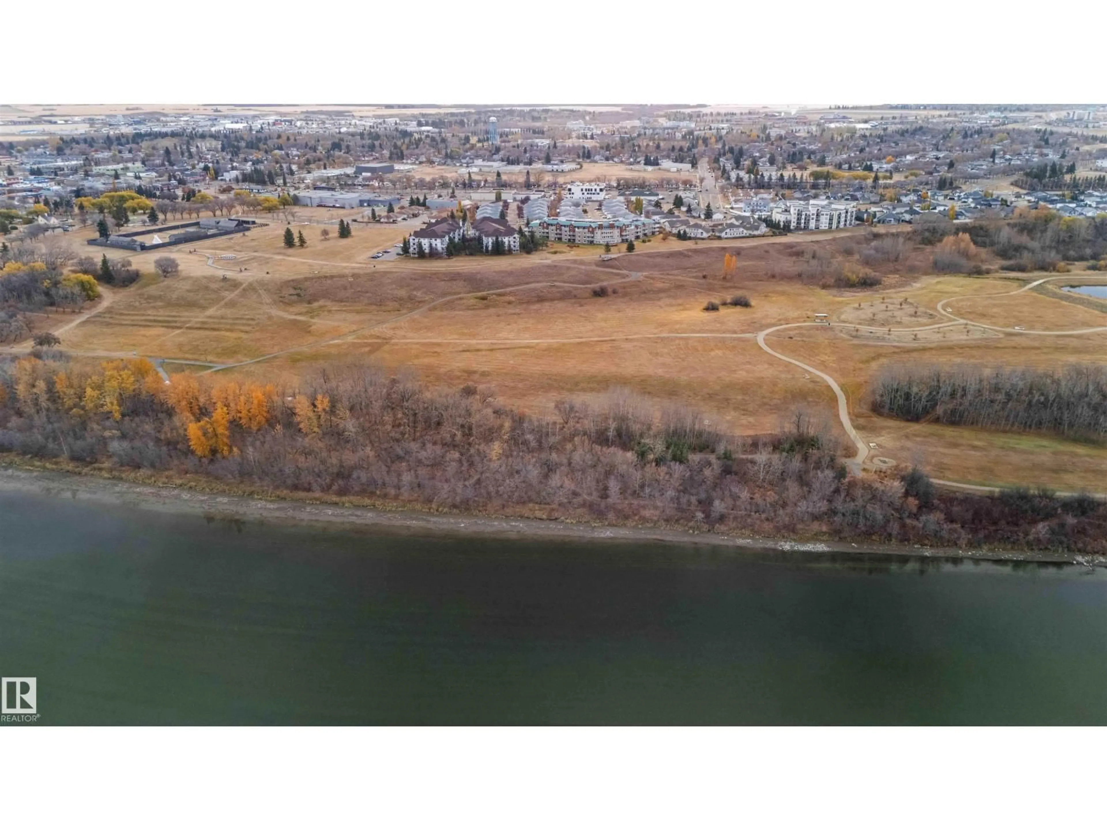 A pic from outside/outdoor area/front of a property/back of a property/a pic from drone, water/lake/river/ocean view for 105 - 9930 100, Fort Saskatchewan Alberta T8L4P3