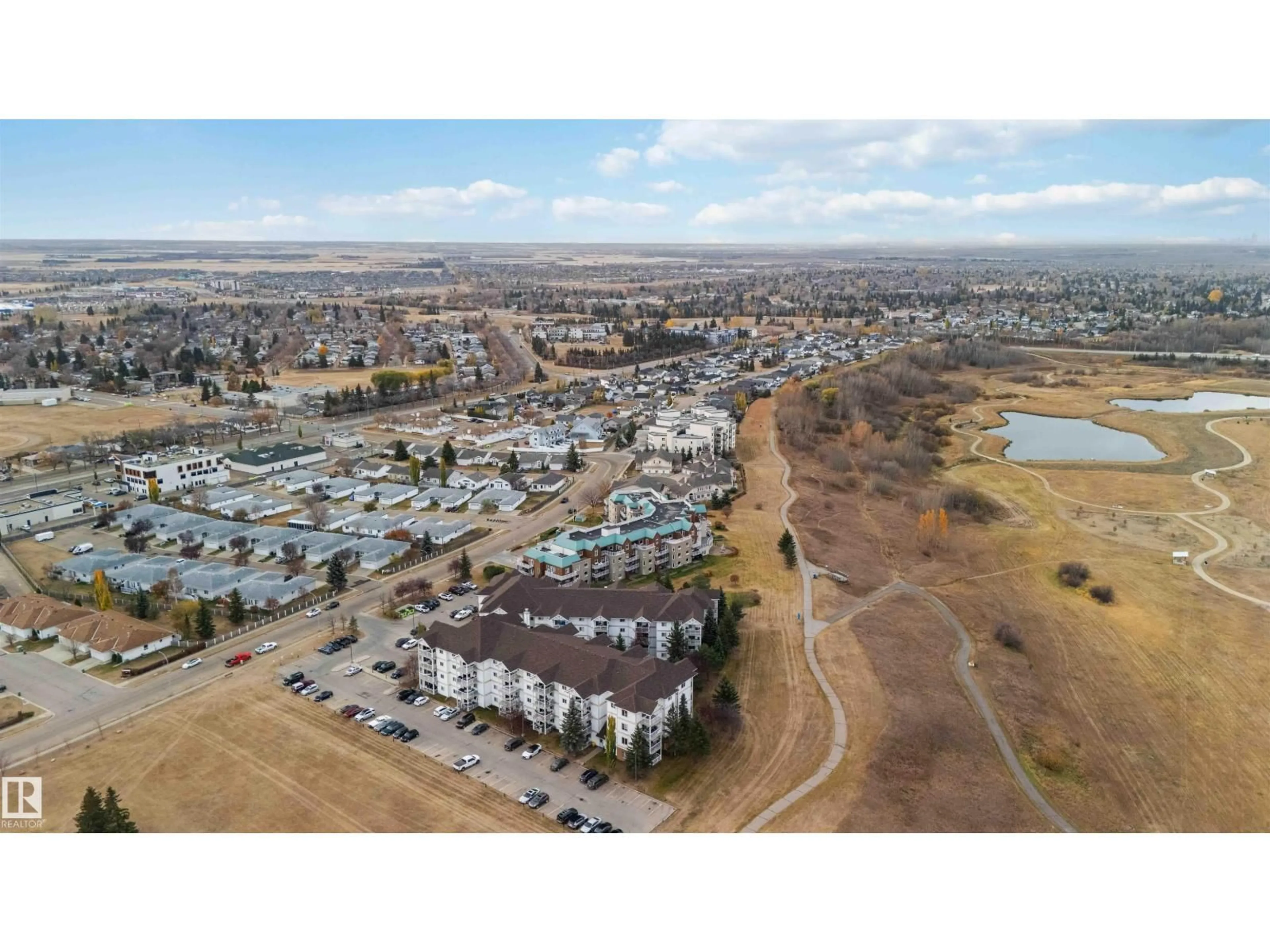 A pic from outside/outdoor area/front of a property/back of a property/a pic from drone, unknown for 105 - 9930 100, Fort Saskatchewan Alberta T8L4P3