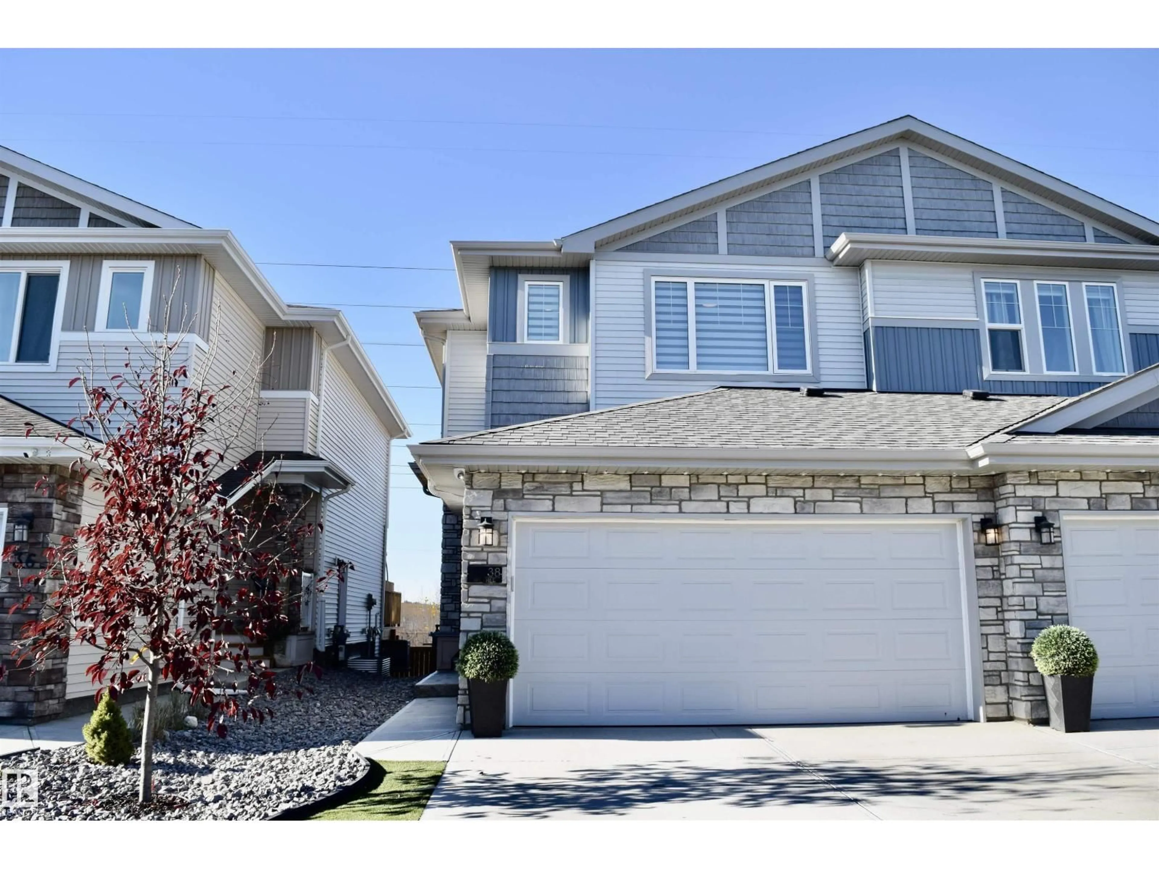 Home with vinyl exterior material, street for 38 WILTREE TC, Fort Saskatchewan Alberta T8L0X6