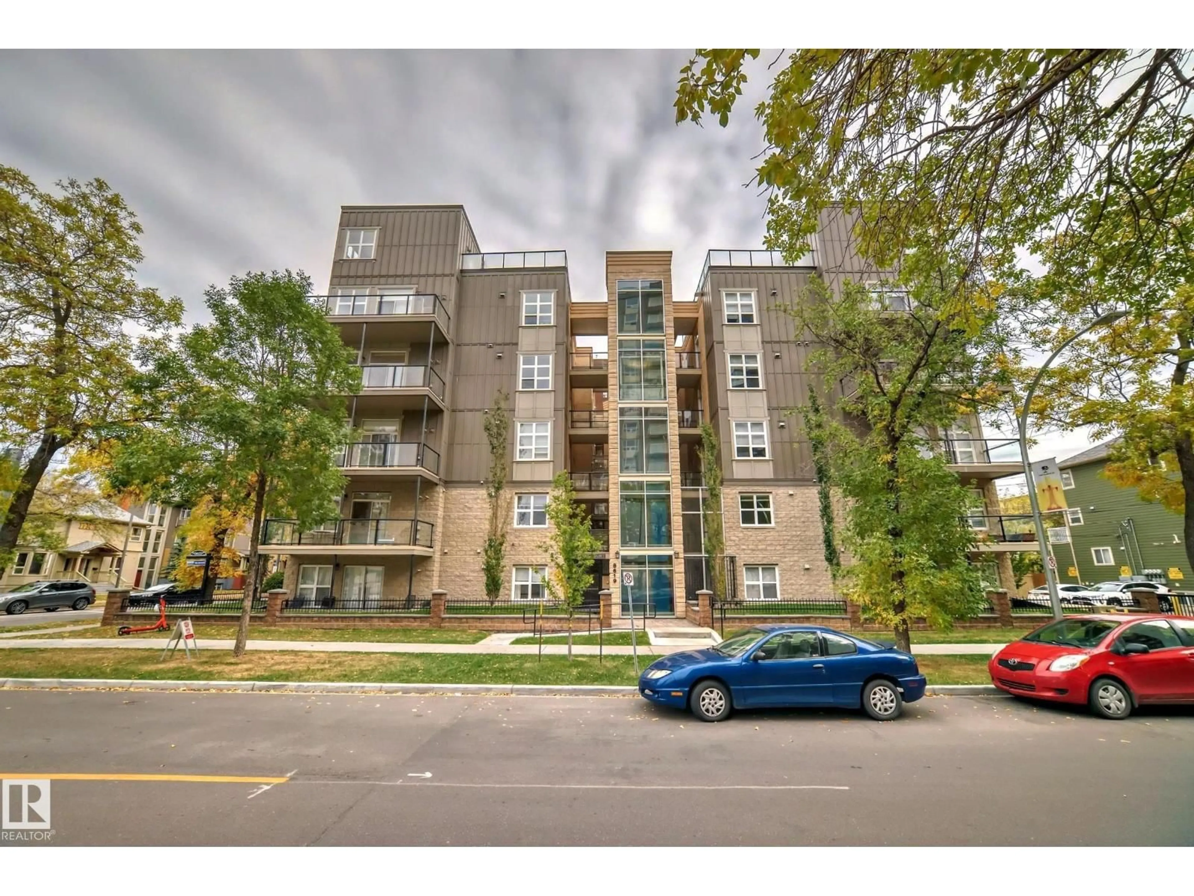 A pic from outside/outdoor area/front of a property/back of a property/a pic from drone, street for #101 - 8619 111 ST, Edmonton Alberta T6G1H8