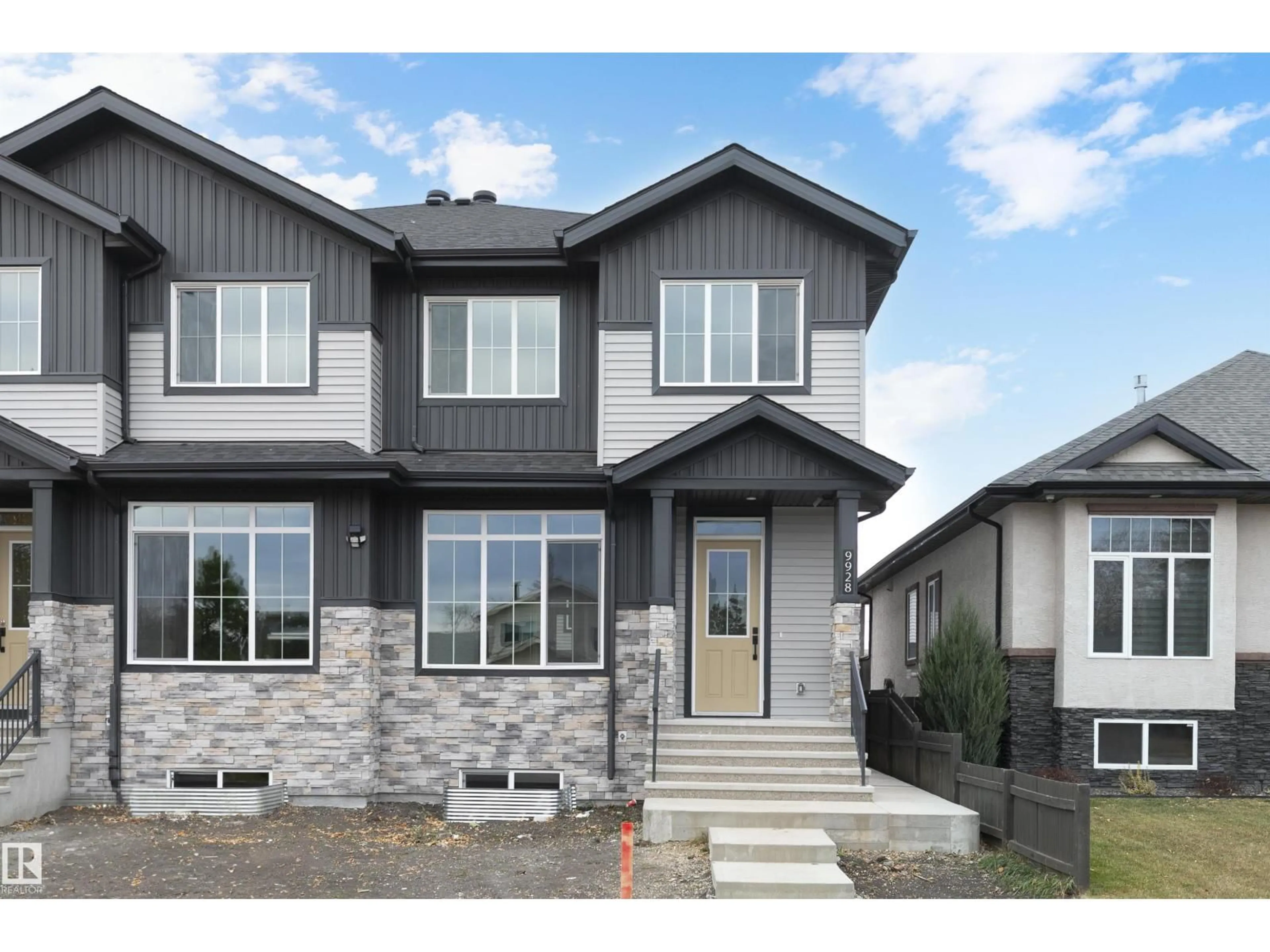 Home with vinyl exterior material, street for 9928 - 9926 157 ST, Edmonton Alberta T5P2T6