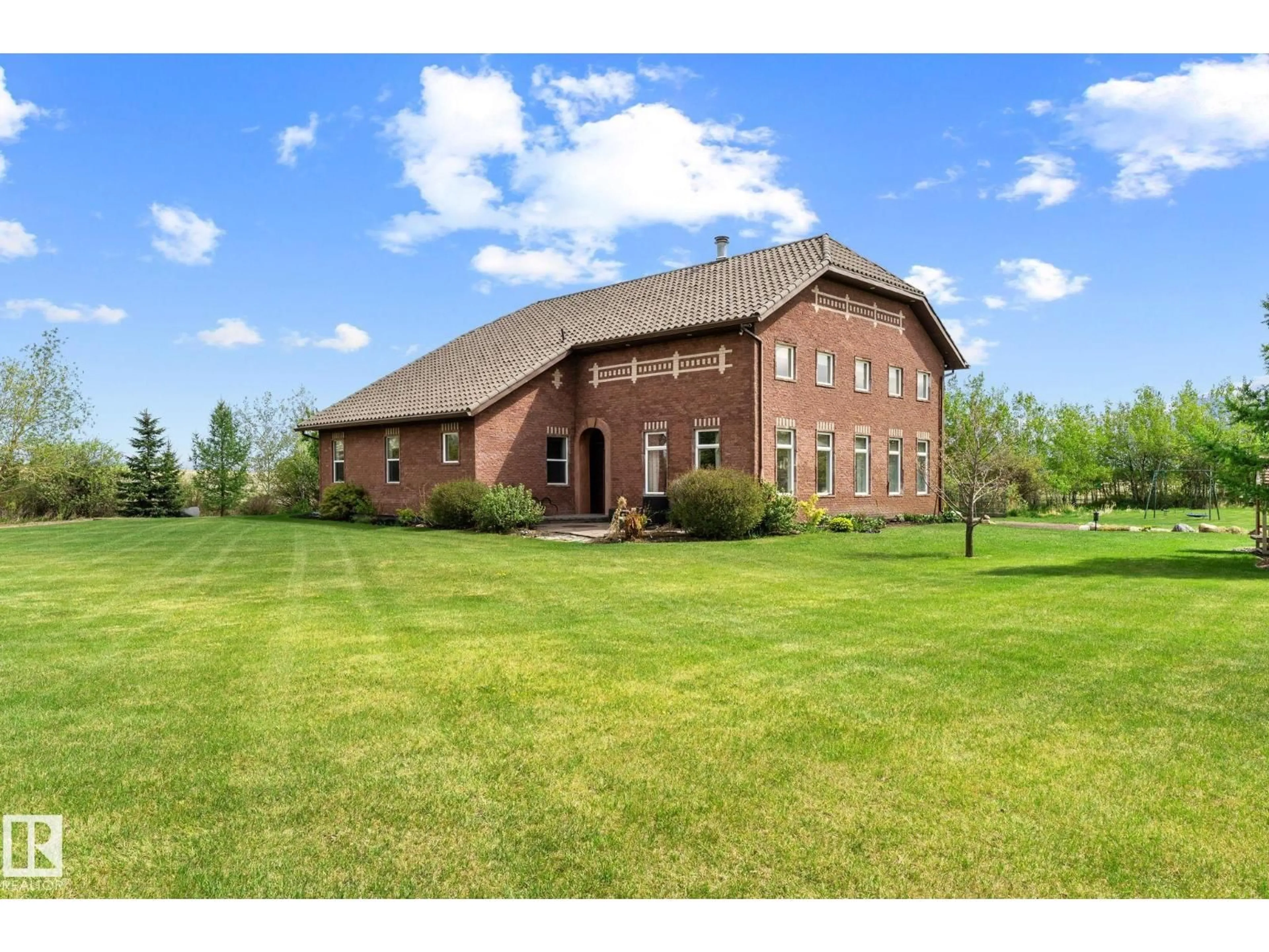 A pic from outside/outdoor area/front of a property/back of a property/a pic from drone, building for 53341 HWY 21, Rural Strathcona County Alberta T8A4V1