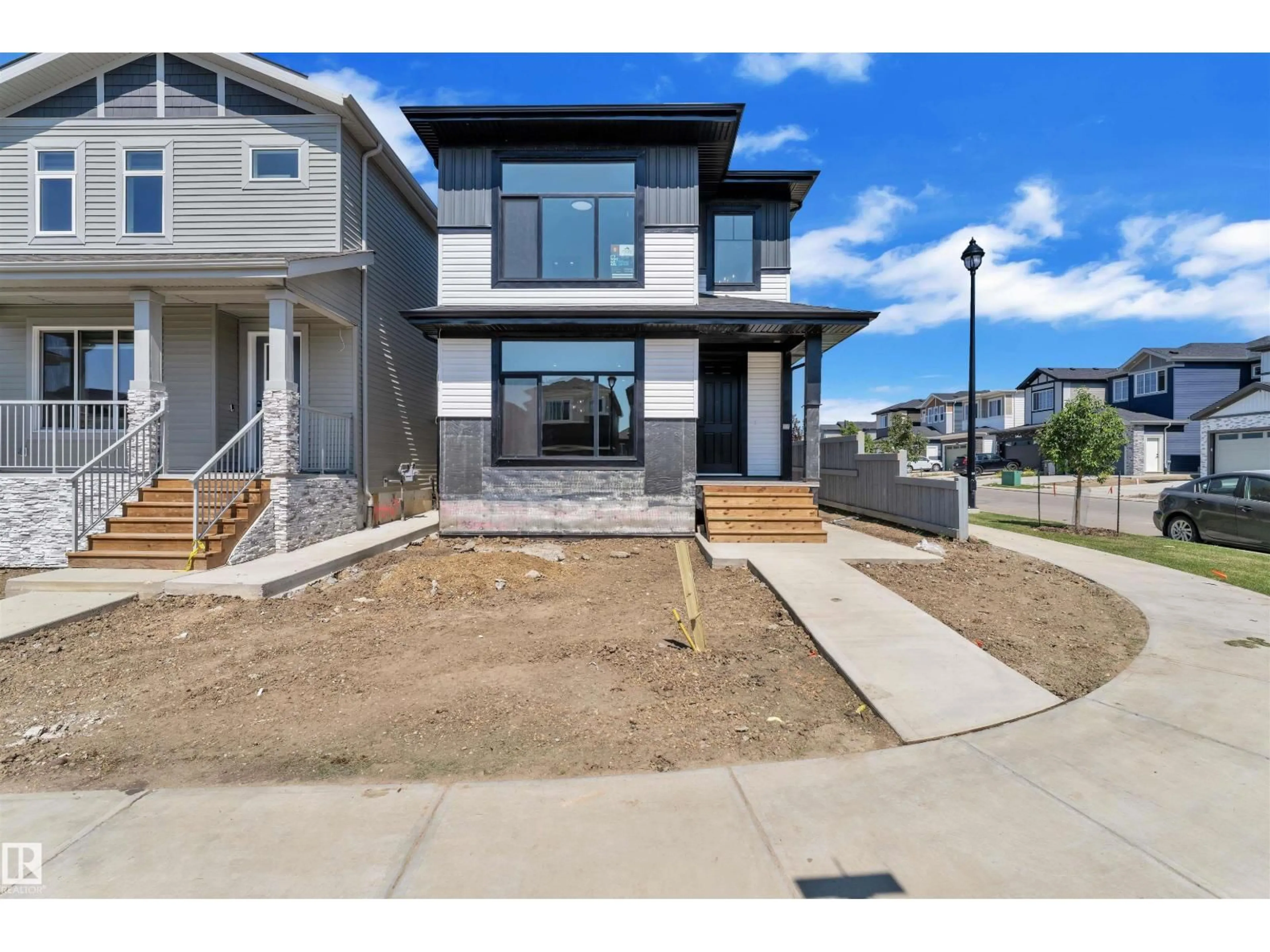 Home with vinyl exterior material, street for 3502 42 AV, Beaumont Alberta T4X3G4