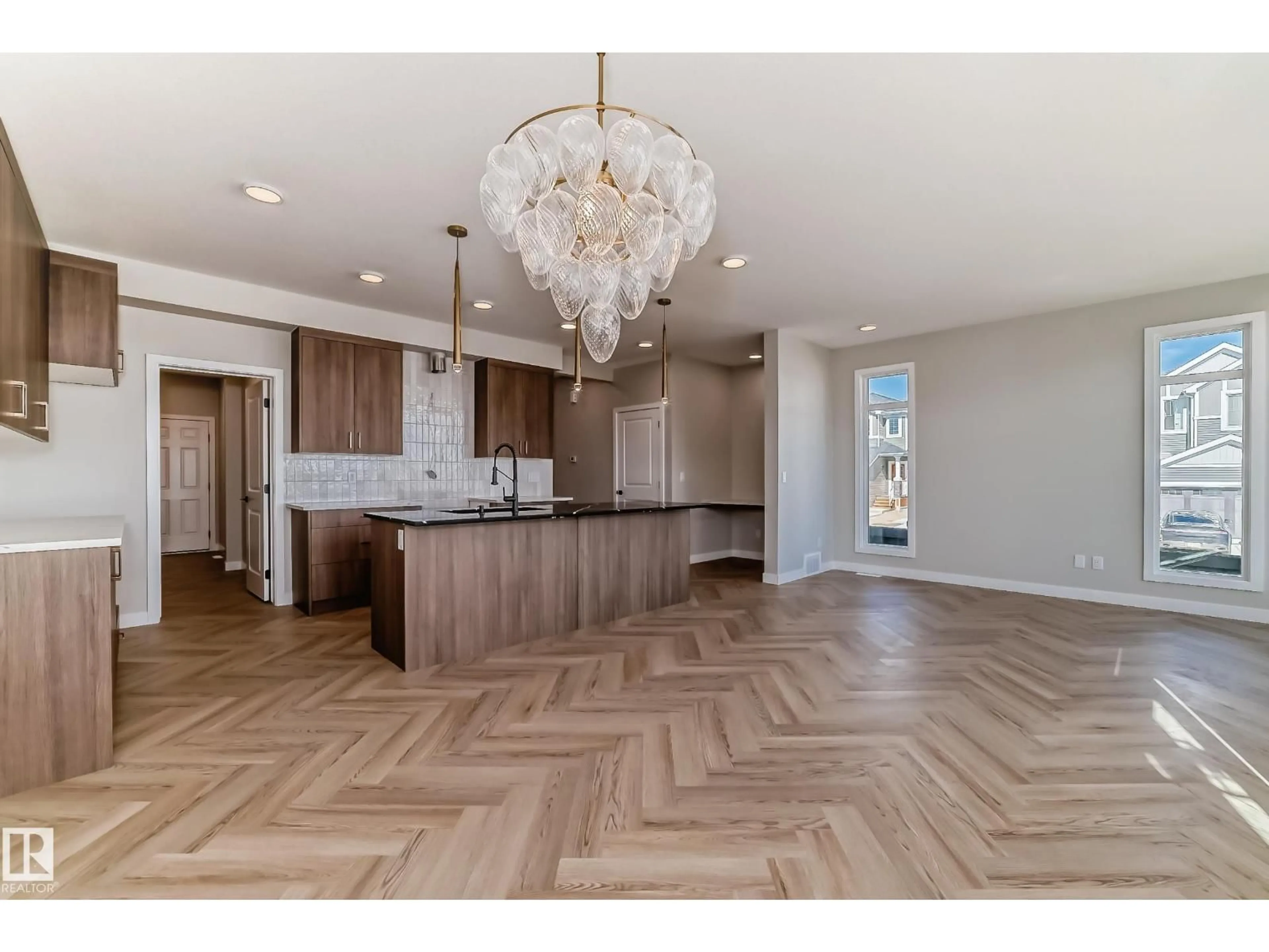 Open concept kitchen, wood/laminate floor for NW - 20612 43 AV, Edmonton Alberta T6M3E3