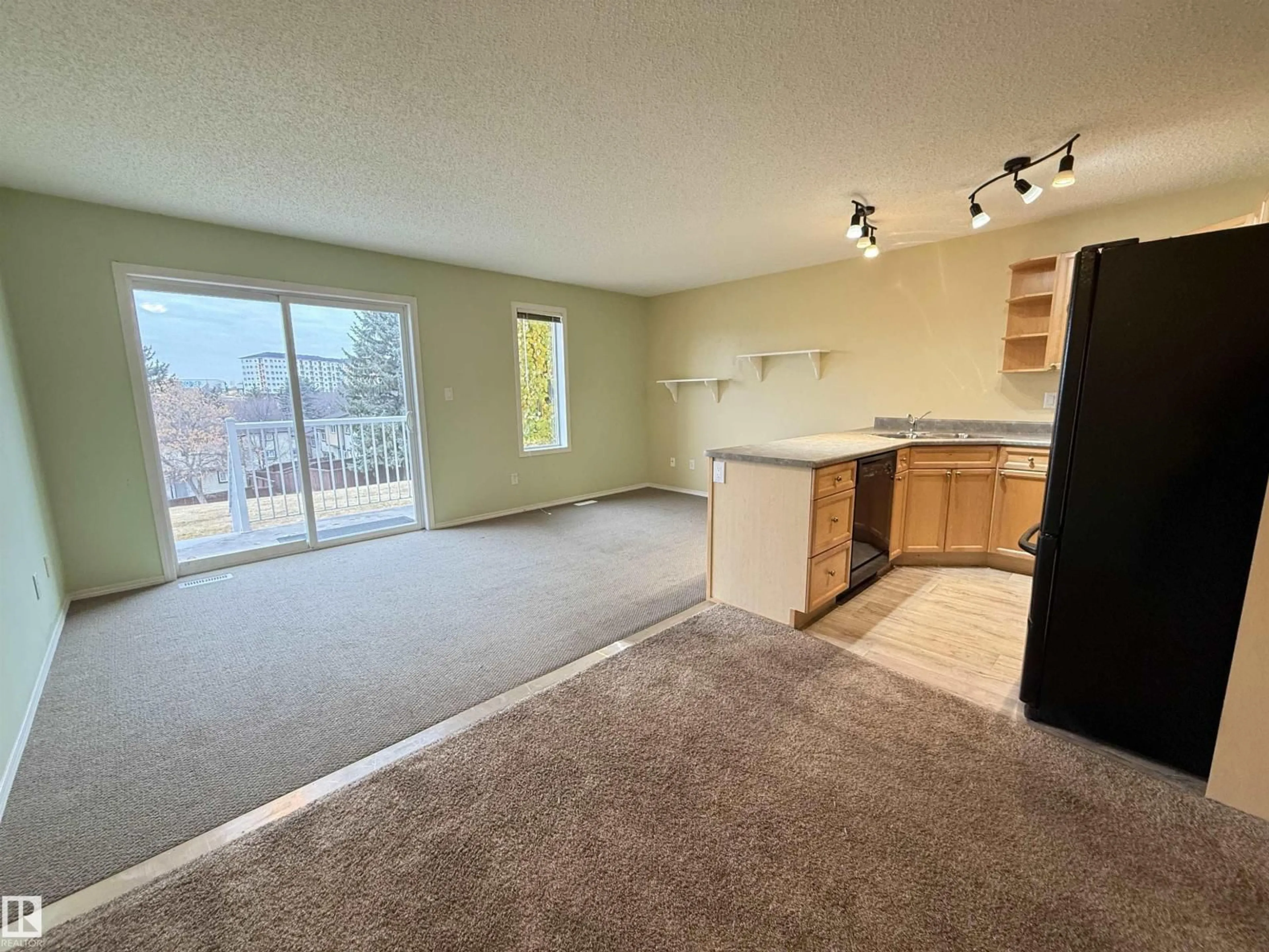 A pic of a room for #26 - 451 HYNDMAN CR, Edmonton Alberta T5A5J3