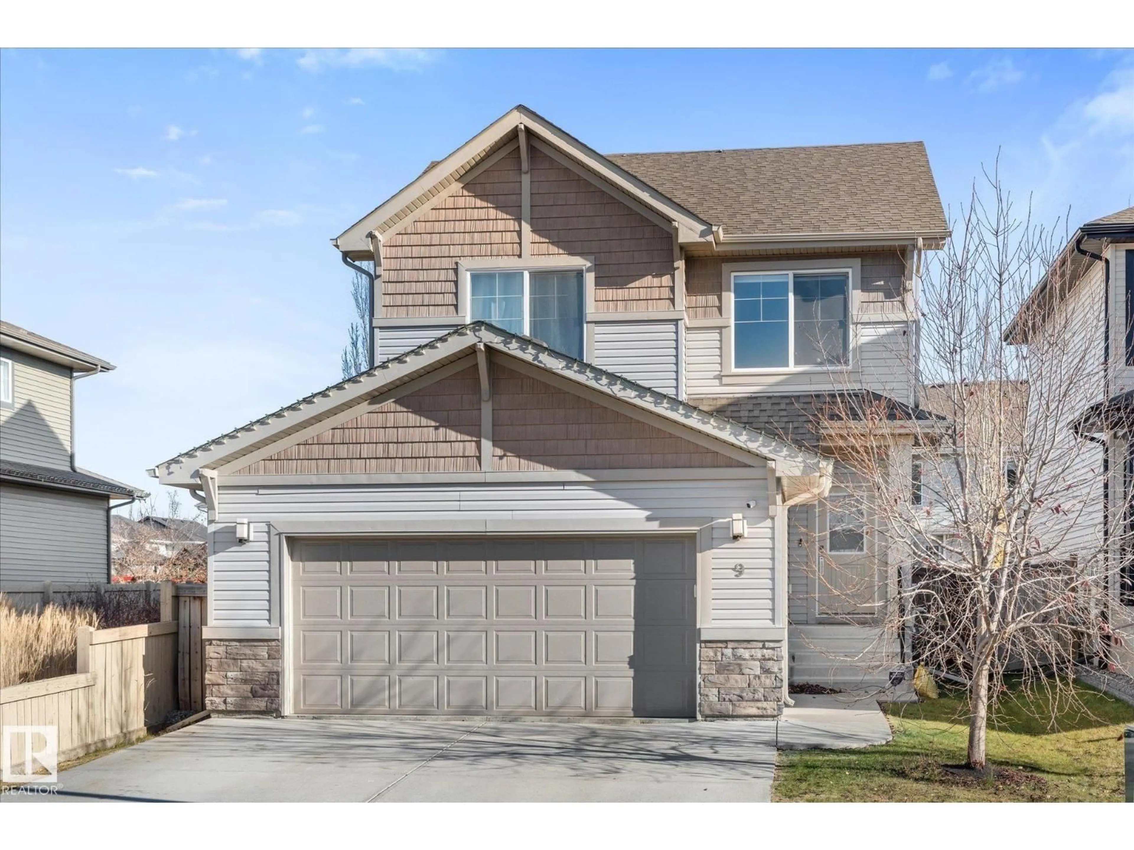 Home with vinyl exterior material, street for 9 SPRING LI, Spruce Grove Alberta T7X0V1