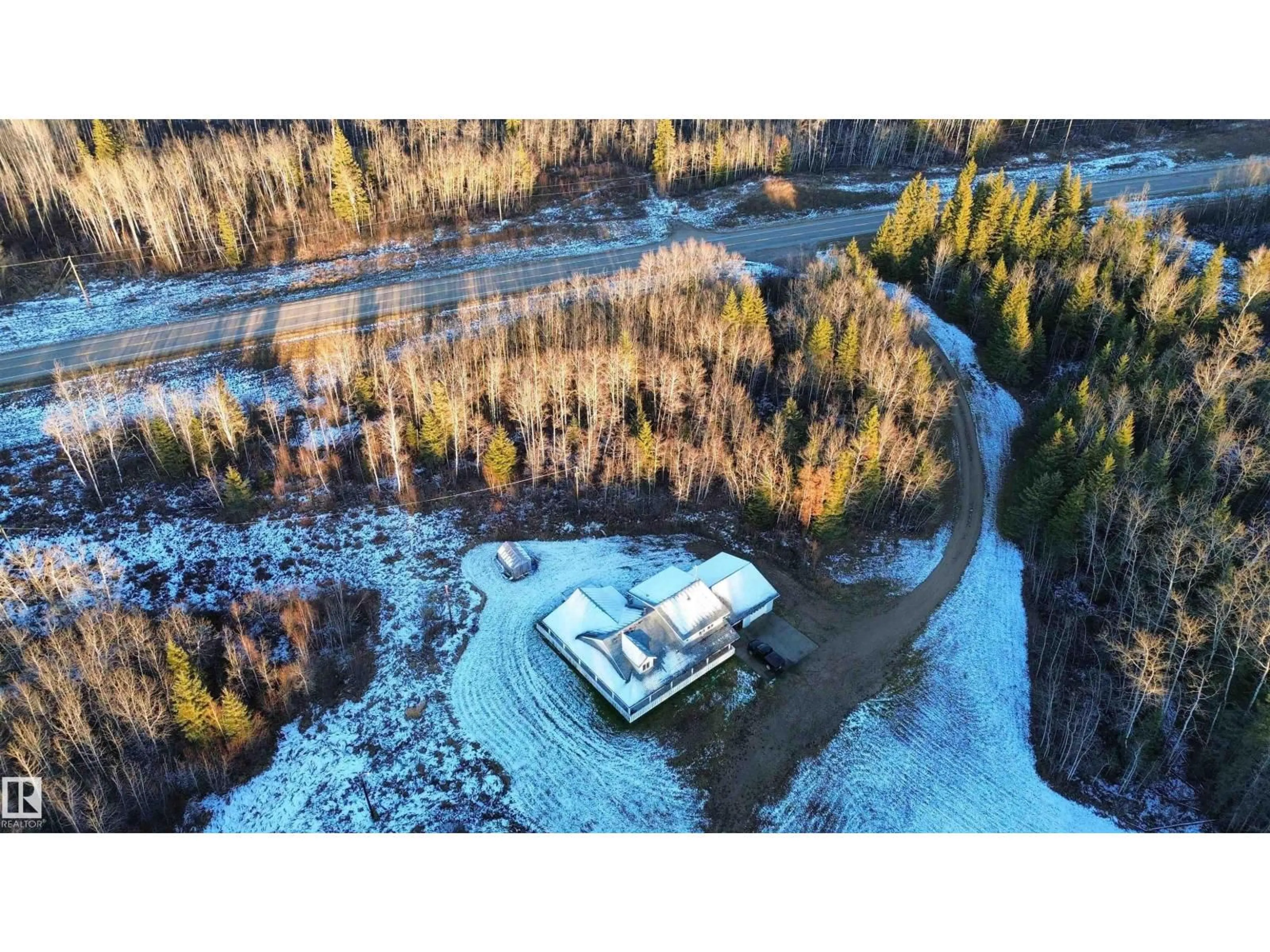 A pic from outside/outdoor area/front of a property/back of a property/a pic from drone, water/lake/river/ocean view for 11215 HWY 55, Rural Lac La Biche County Alberta T0A1S0