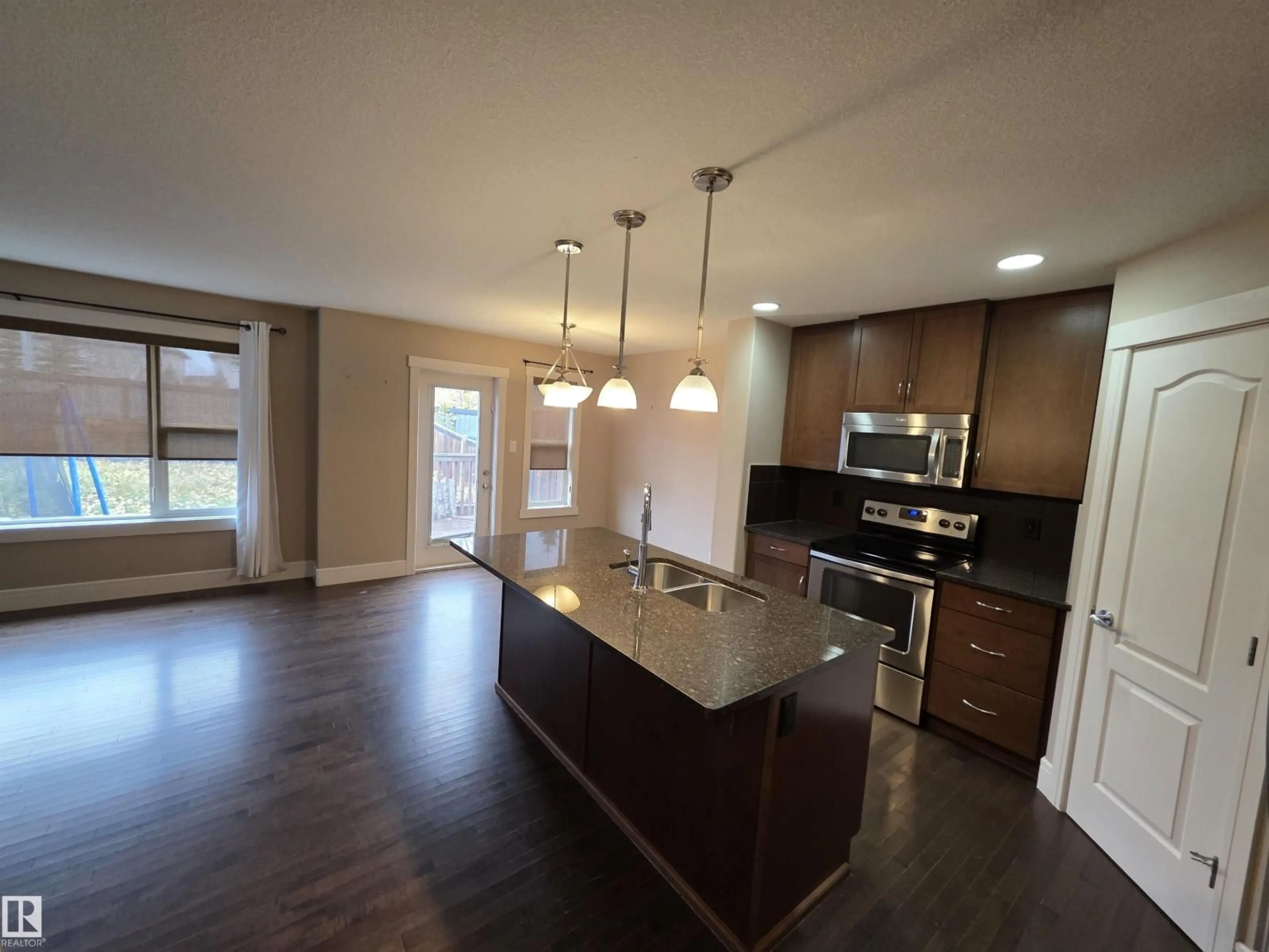 Open concept kitchen, wood/laminate floor for 2008 WESTERRA LO, Stony Plain Alberta T5S0A1