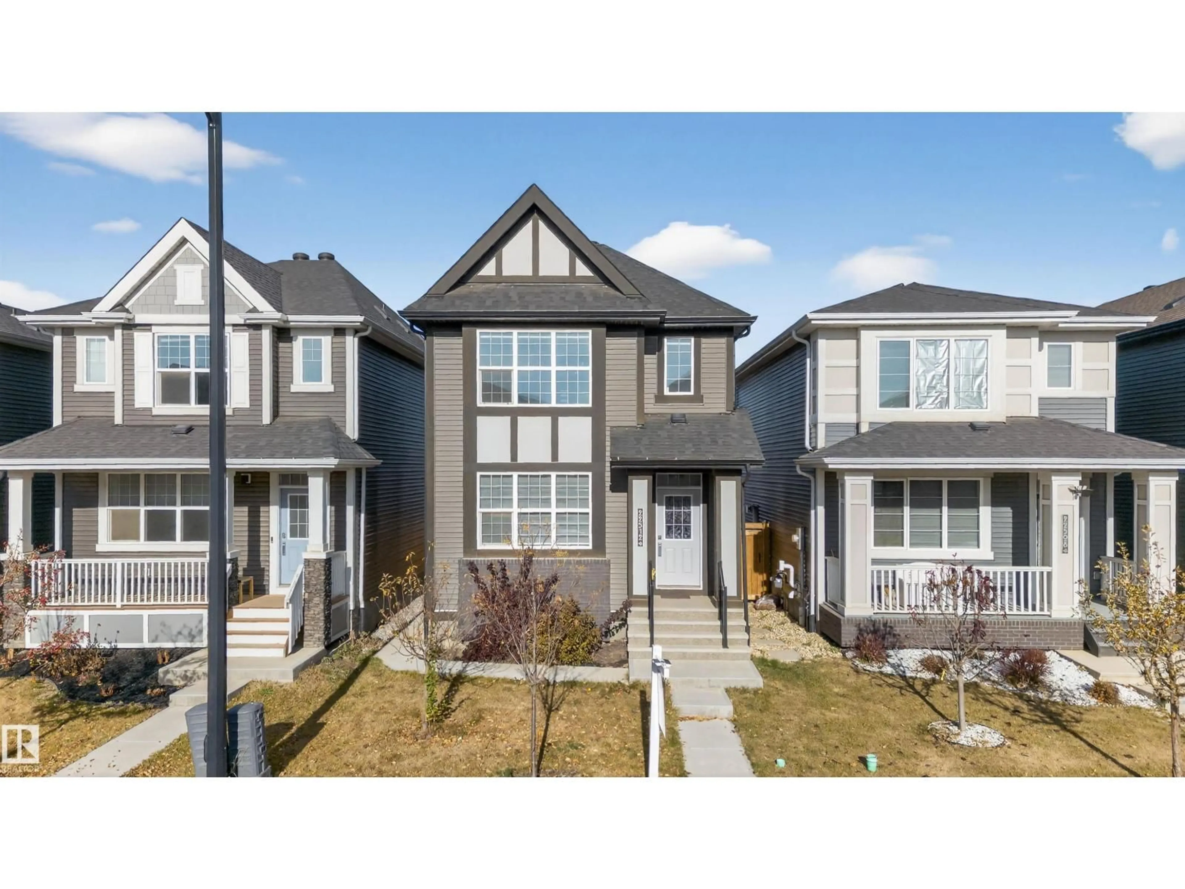 Home with vinyl exterior material, street for 22512 80 AV, Edmonton Alberta T5T7H8