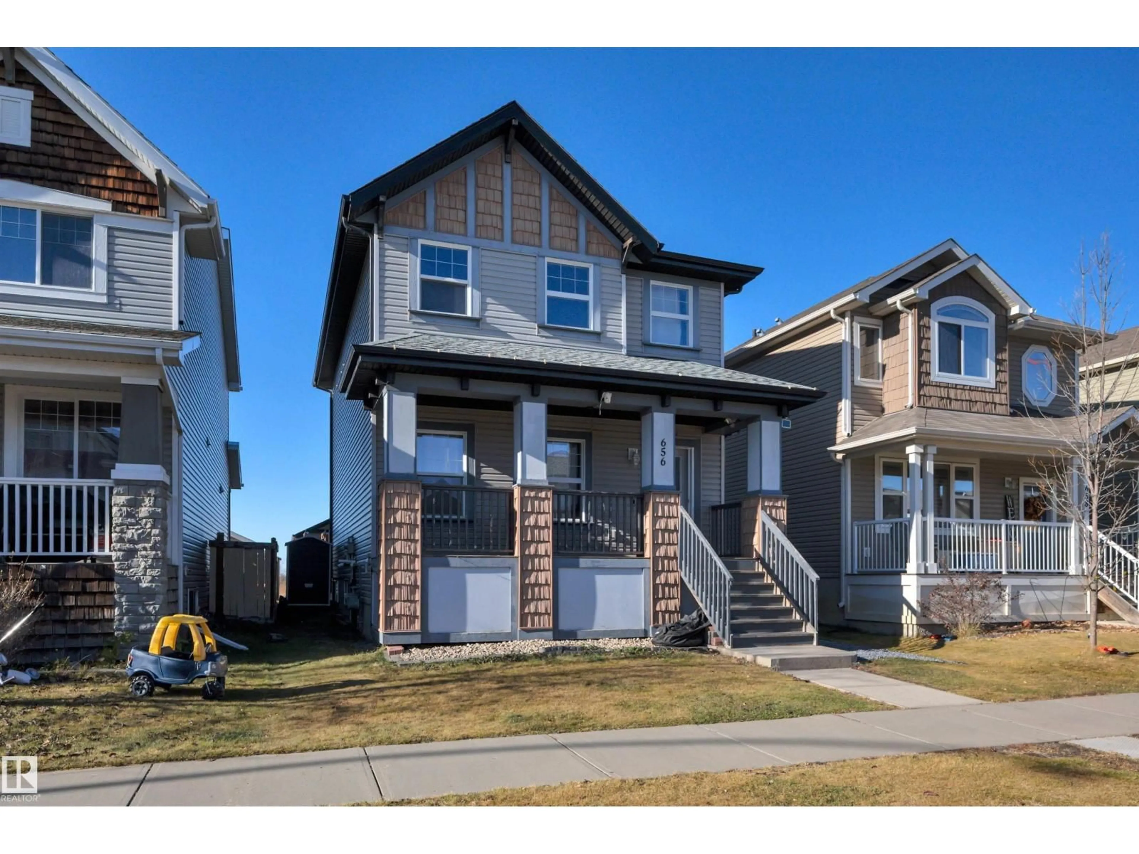 Home with brick exterior material, street for 656 SONGHURST WD, Leduc Alberta T9E0R1