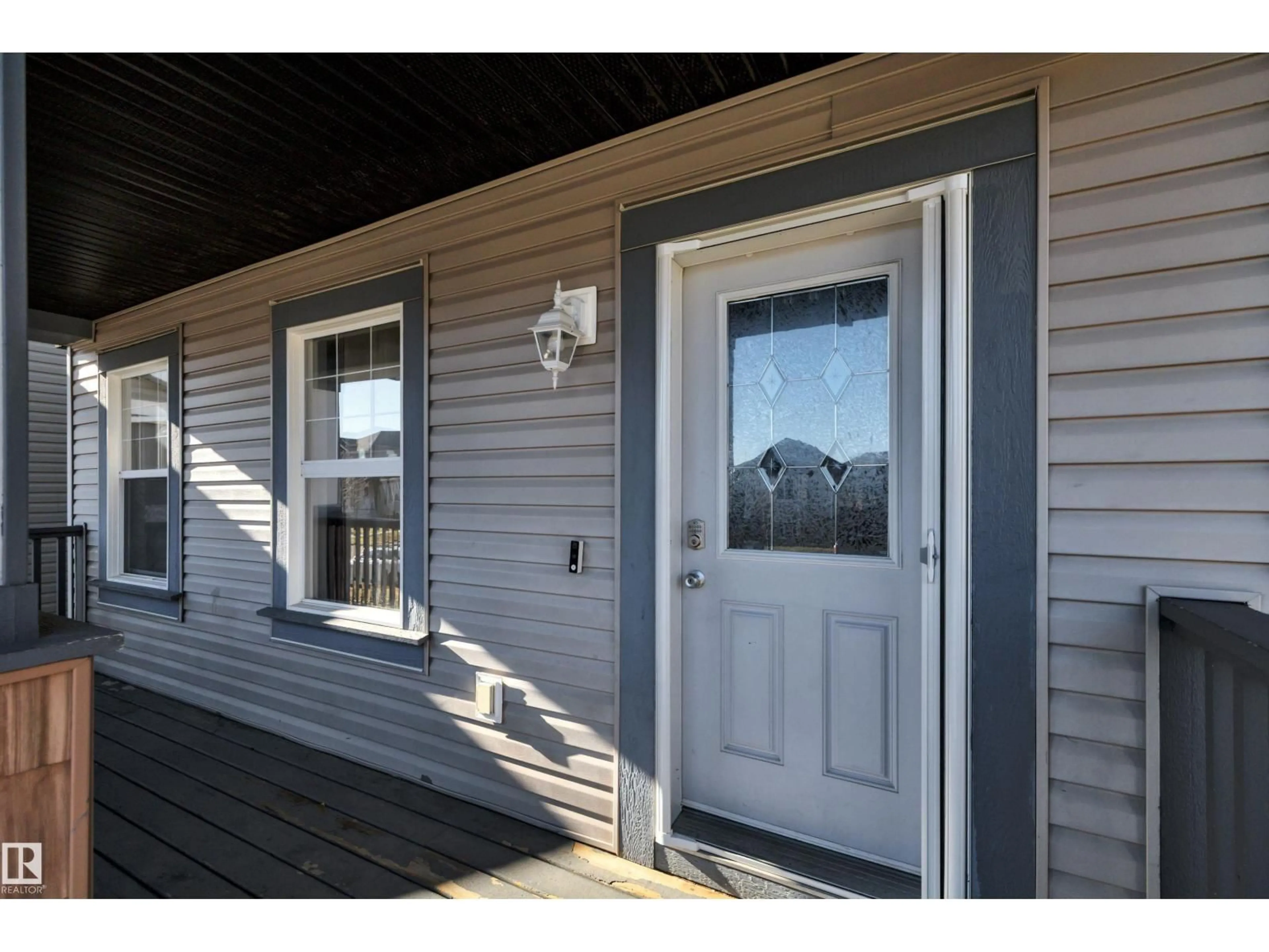 Home with vinyl exterior material, street for 656 SONGHURST WD, Leduc Alberta T9E0R1