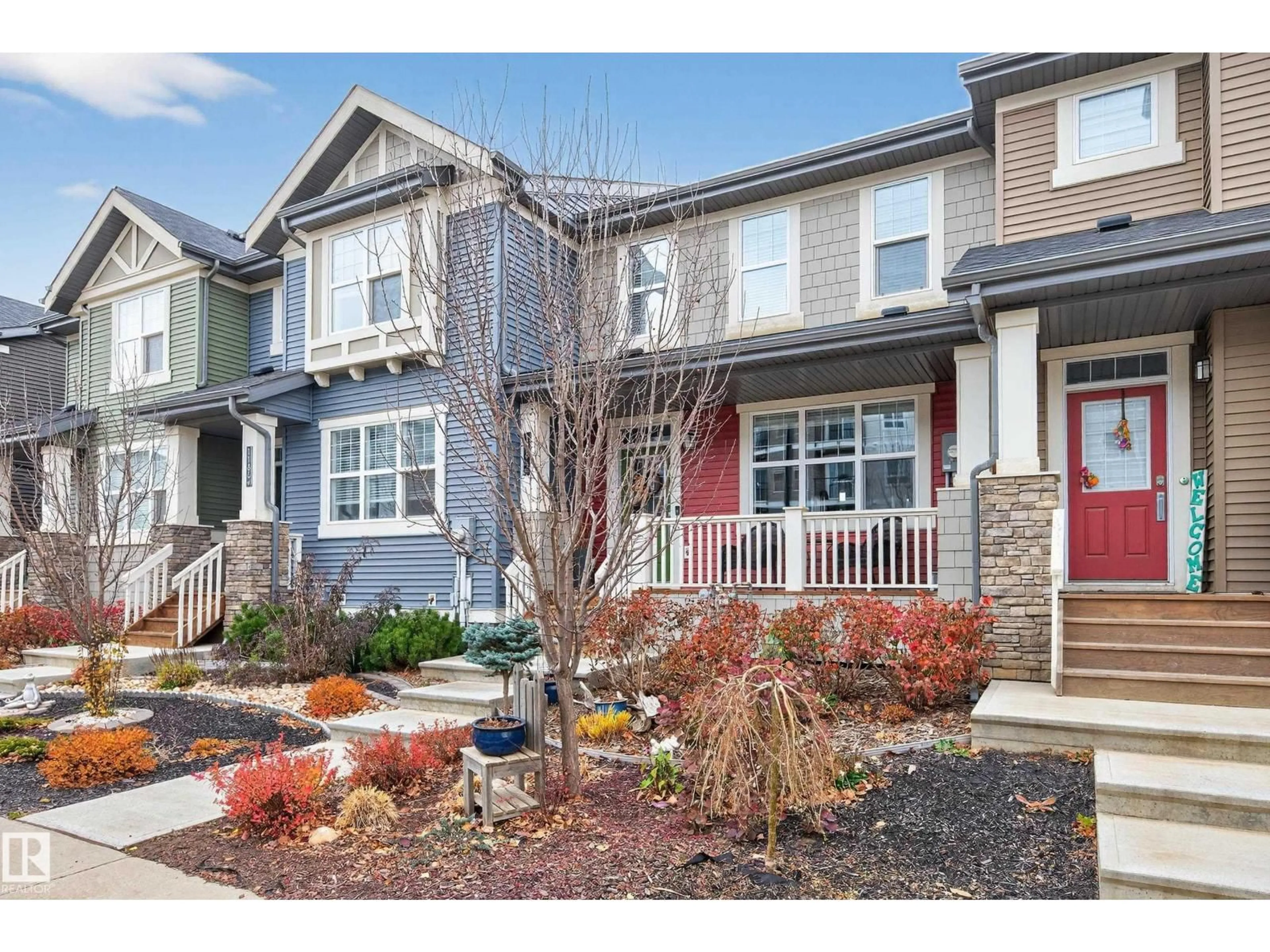 Home with vinyl exterior material, street for 1184 ROSENTHAL BV, Edmonton Alberta T5T7L3