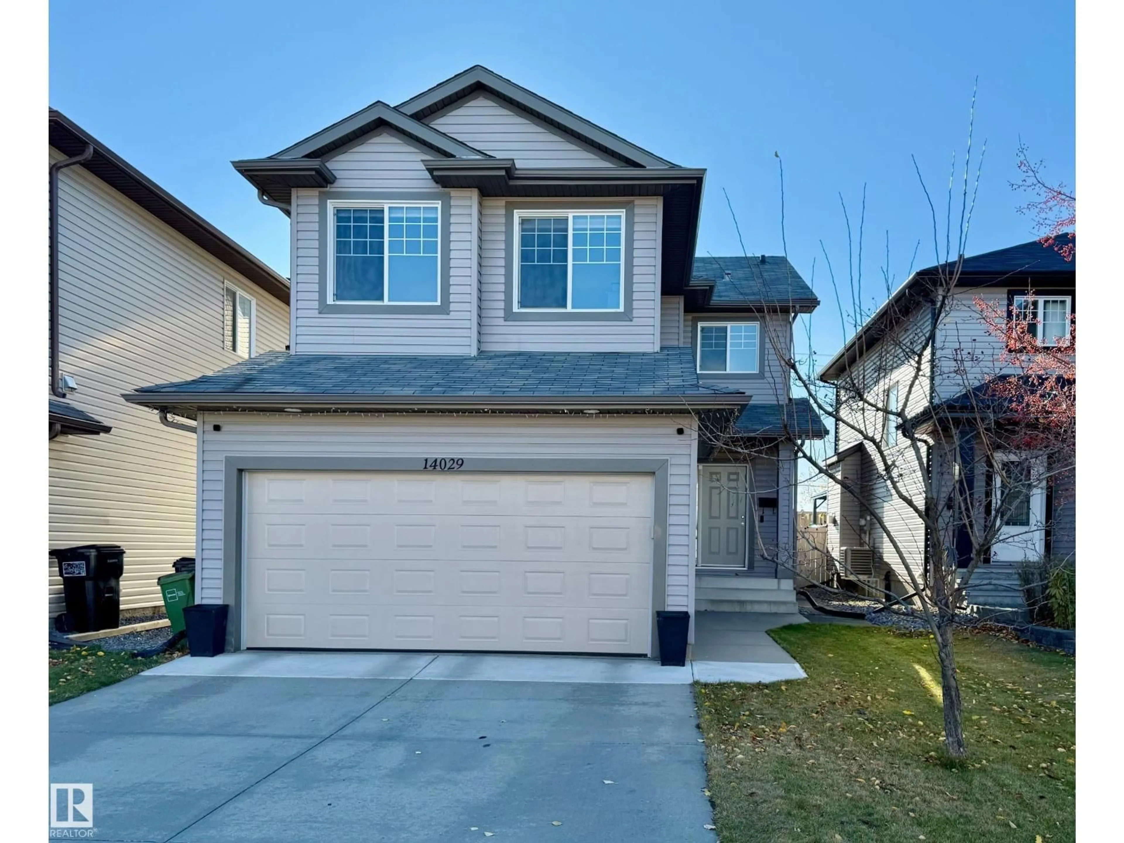 Home with vinyl exterior material, street for 14029 145 AV, Edmonton Alberta T6V1Y2