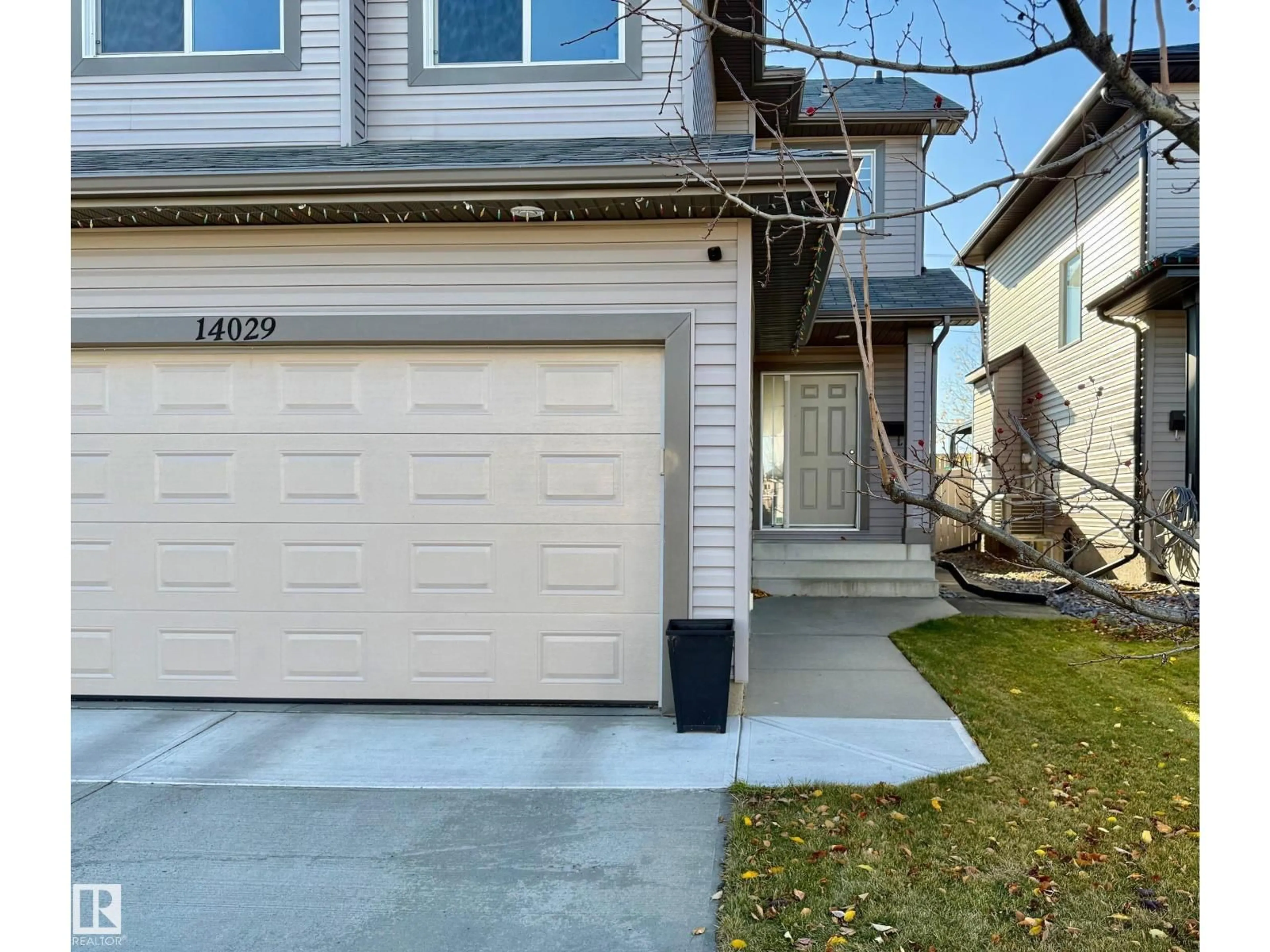 Home with vinyl exterior material, street for 14029 145 AV, Edmonton Alberta T6V1Y2