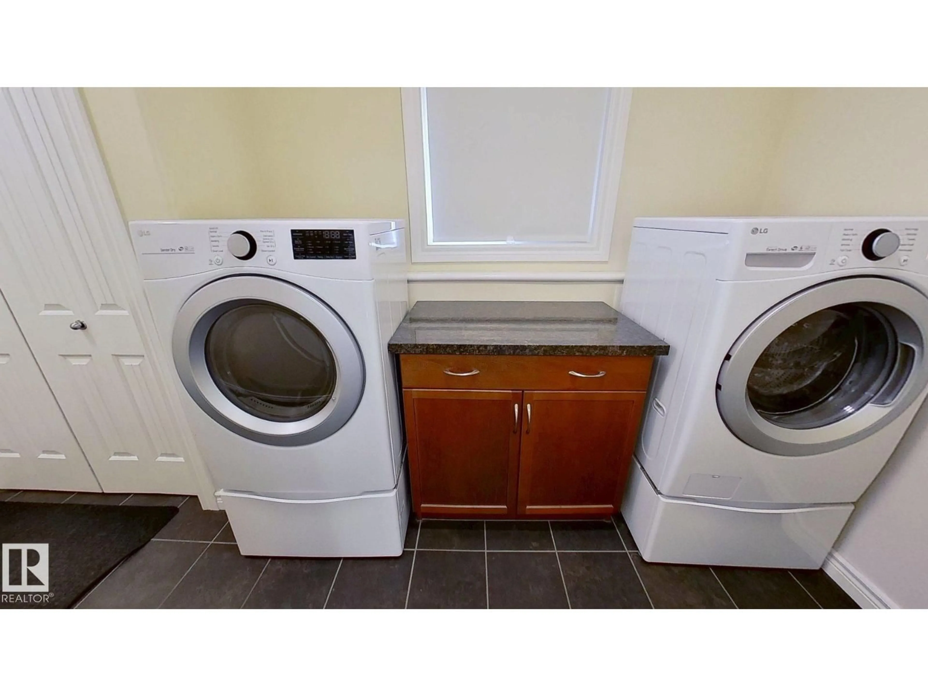 Laundry room for 14029 145 AV, Edmonton Alberta T6V1Y2