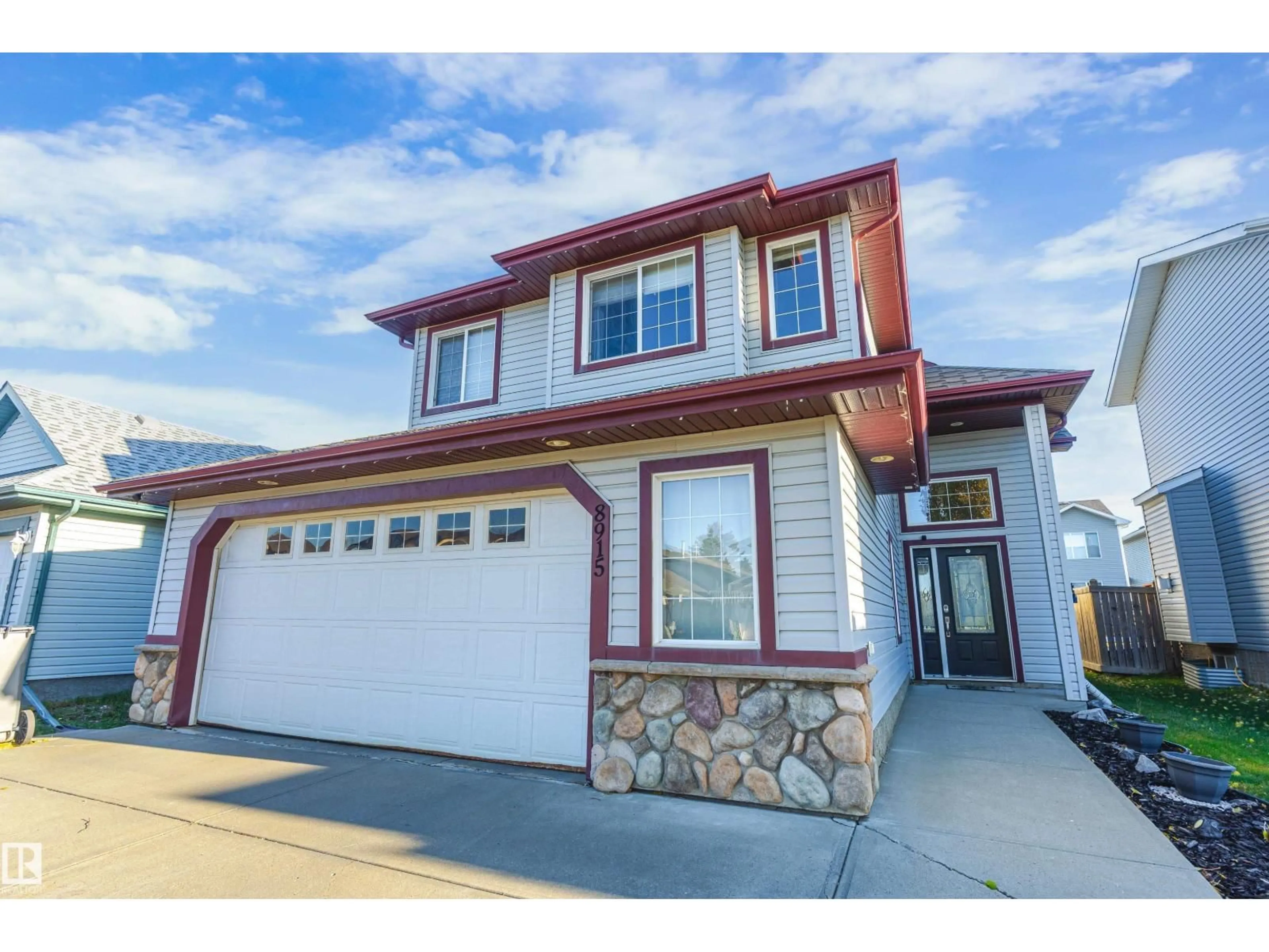 Home with vinyl exterior material, street for 8915 98 AV, Morinville Alberta T8R1T8