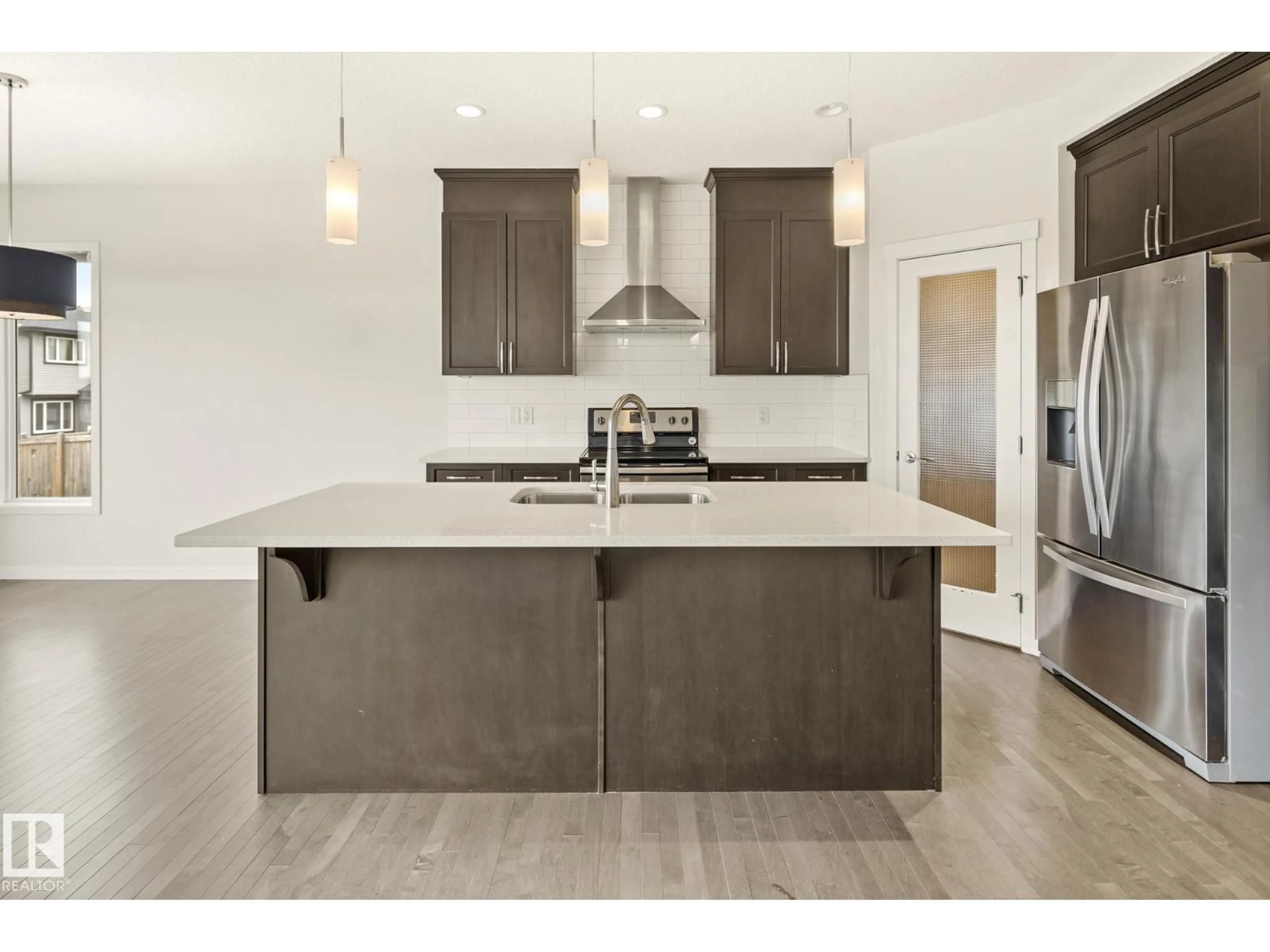 Open concept kitchen, unknown for 5404 22 AV, Edmonton Alberta T6X2H8