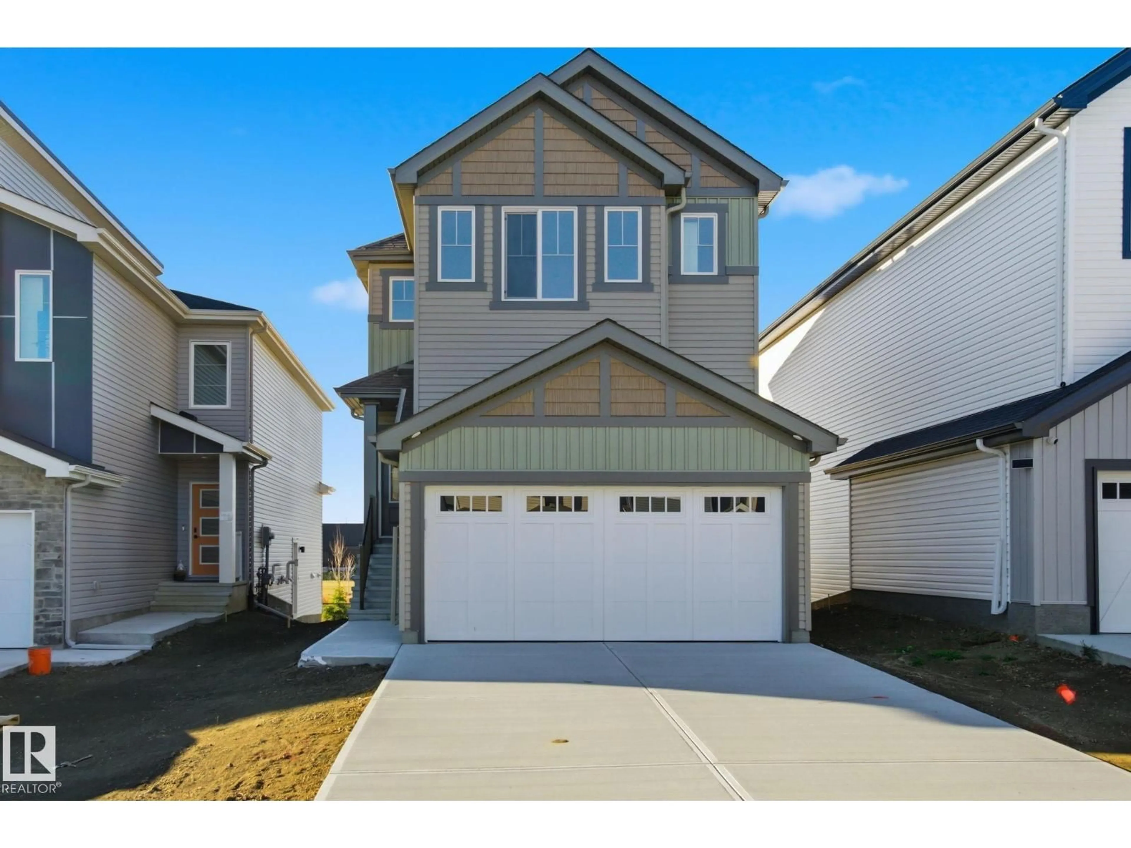 Home with vinyl exterior material, street for 7104 47A ST, Beaumont Alberta T4X3B7