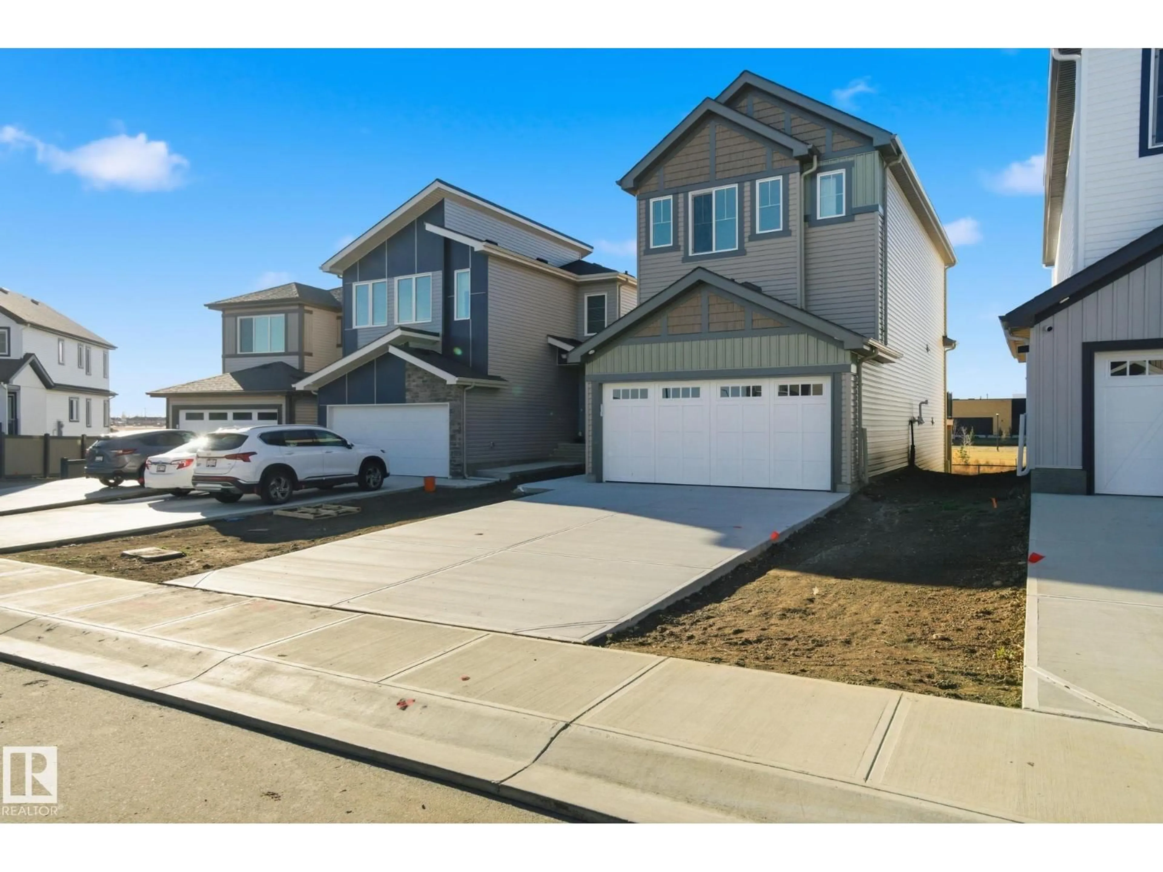 Home with vinyl exterior material, street for 7104 47A ST, Beaumont Alberta T4X3B7