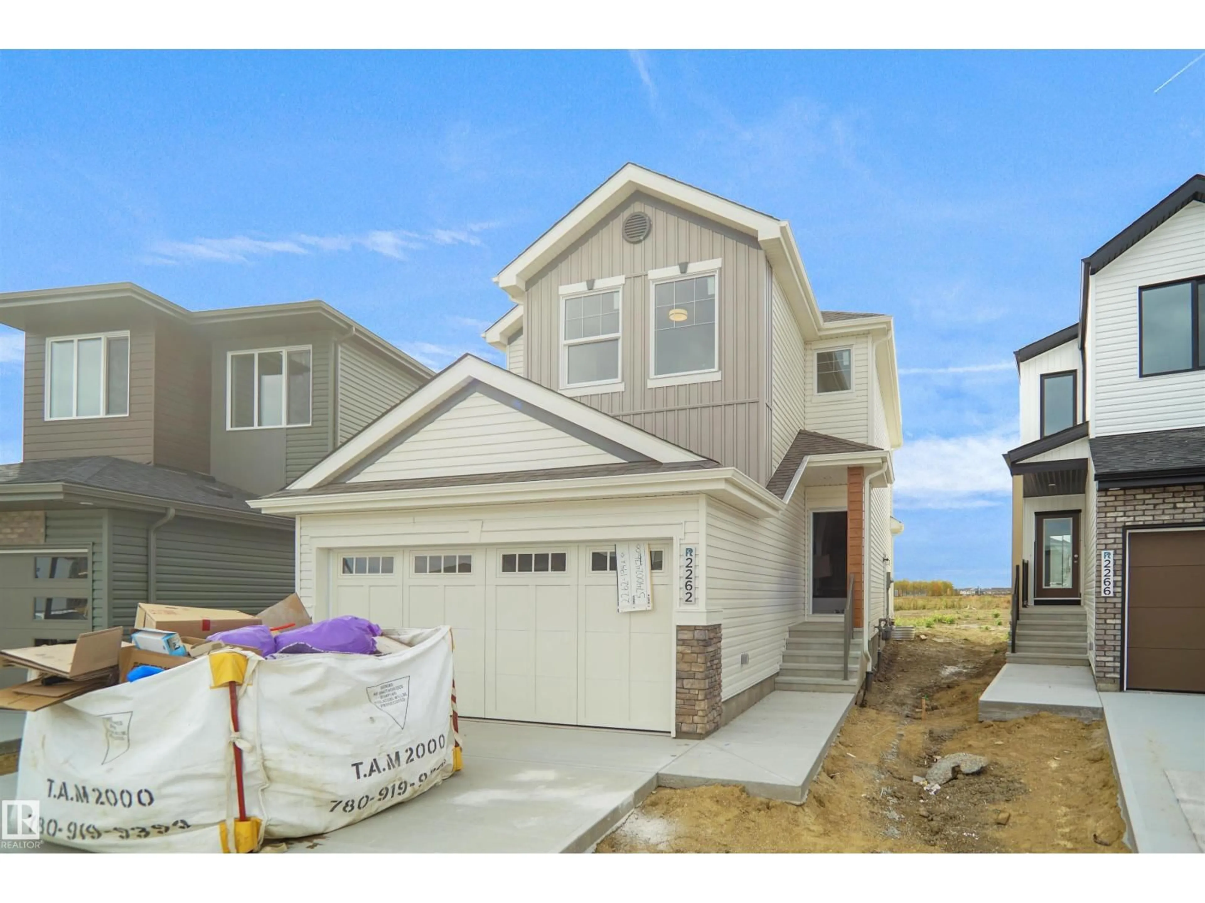 Home with vinyl exterior material, street for NW - 2262 194A ST, Edmonton Alberta T6M1P7