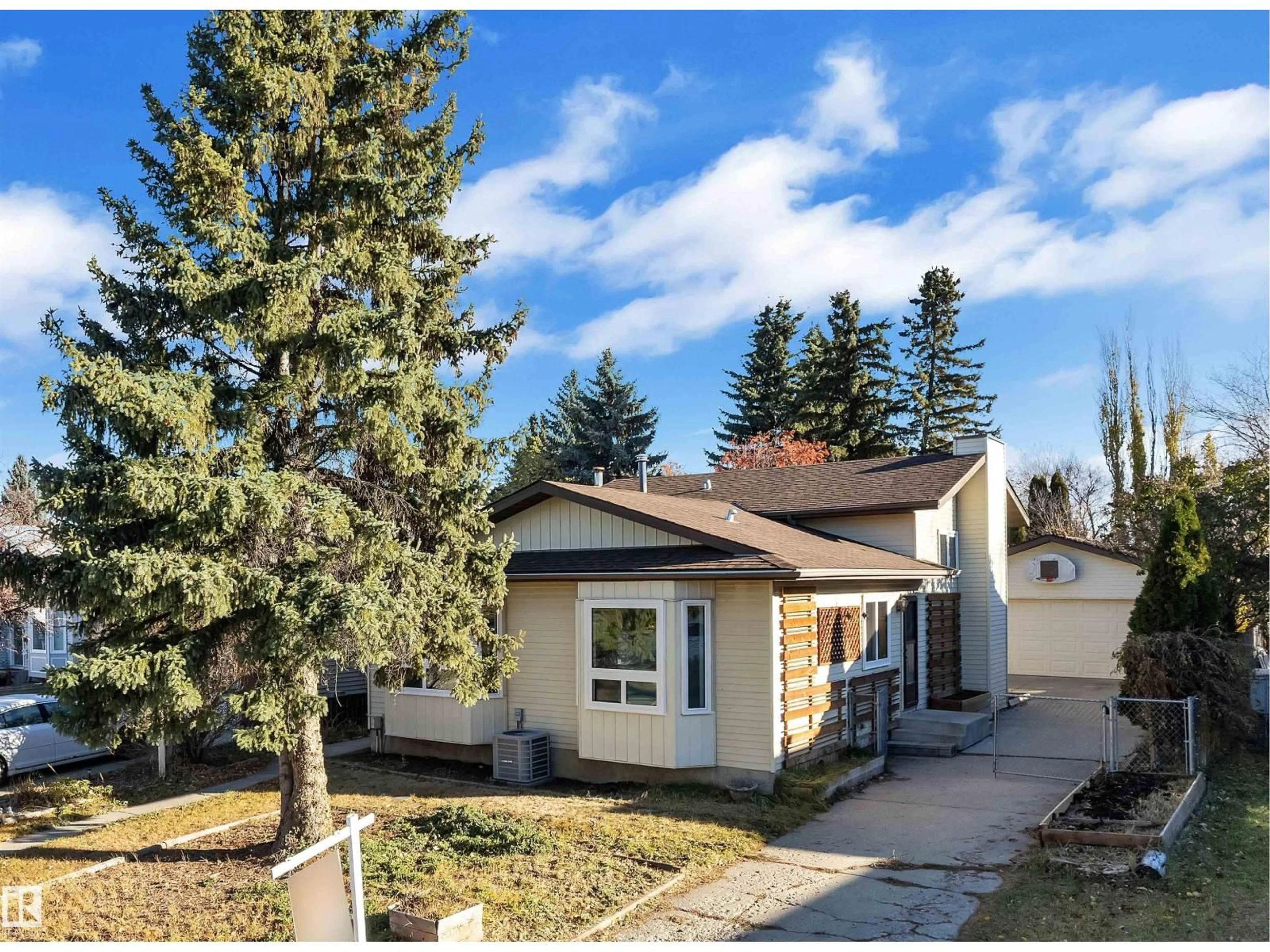 Home with vinyl exterior material, street for 1111 49A ST, Edmonton Alberta T6L4C5