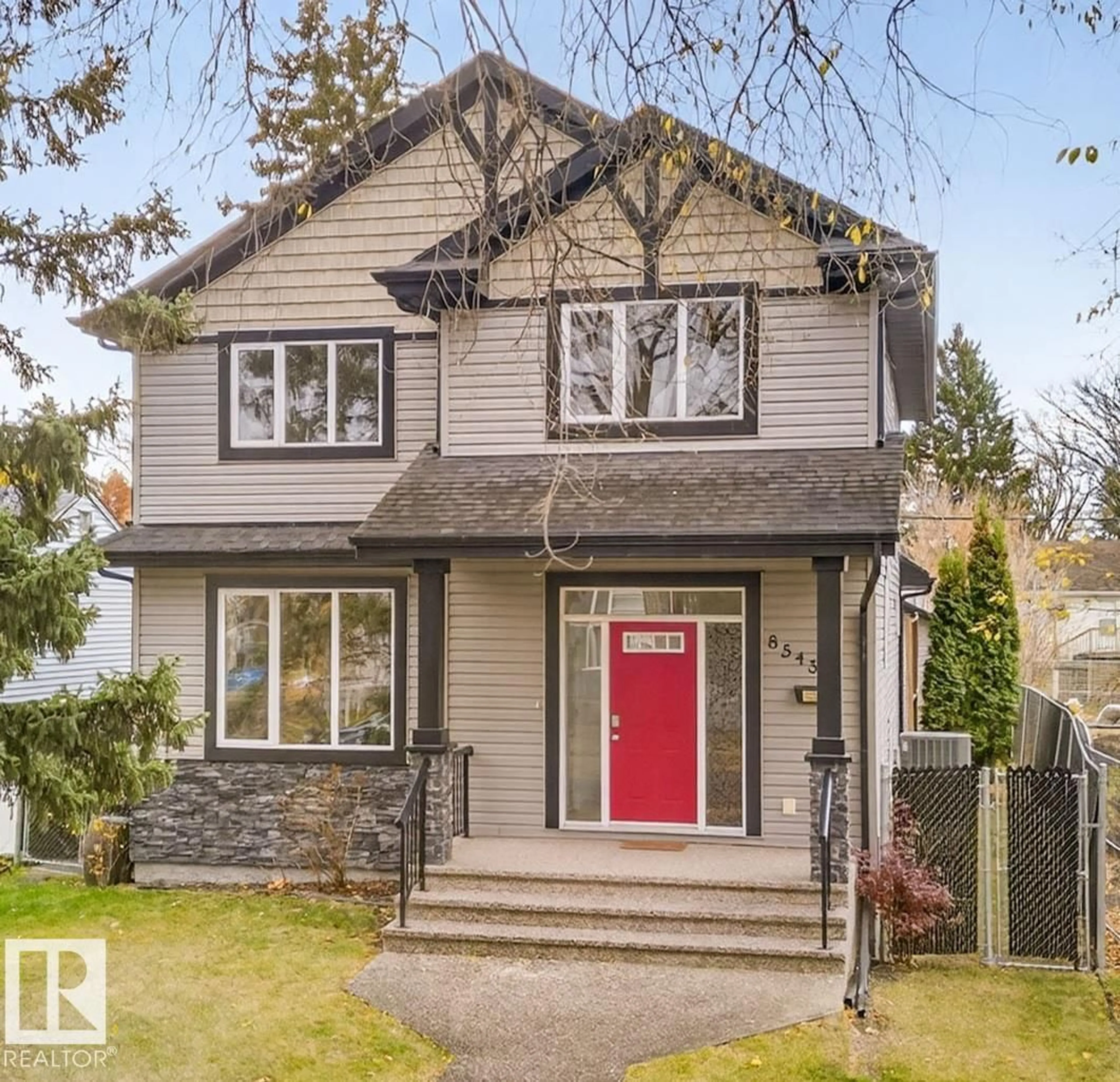 Home with vinyl exterior material, street for 8543 81 AV, Edmonton Alberta T6C0W3
