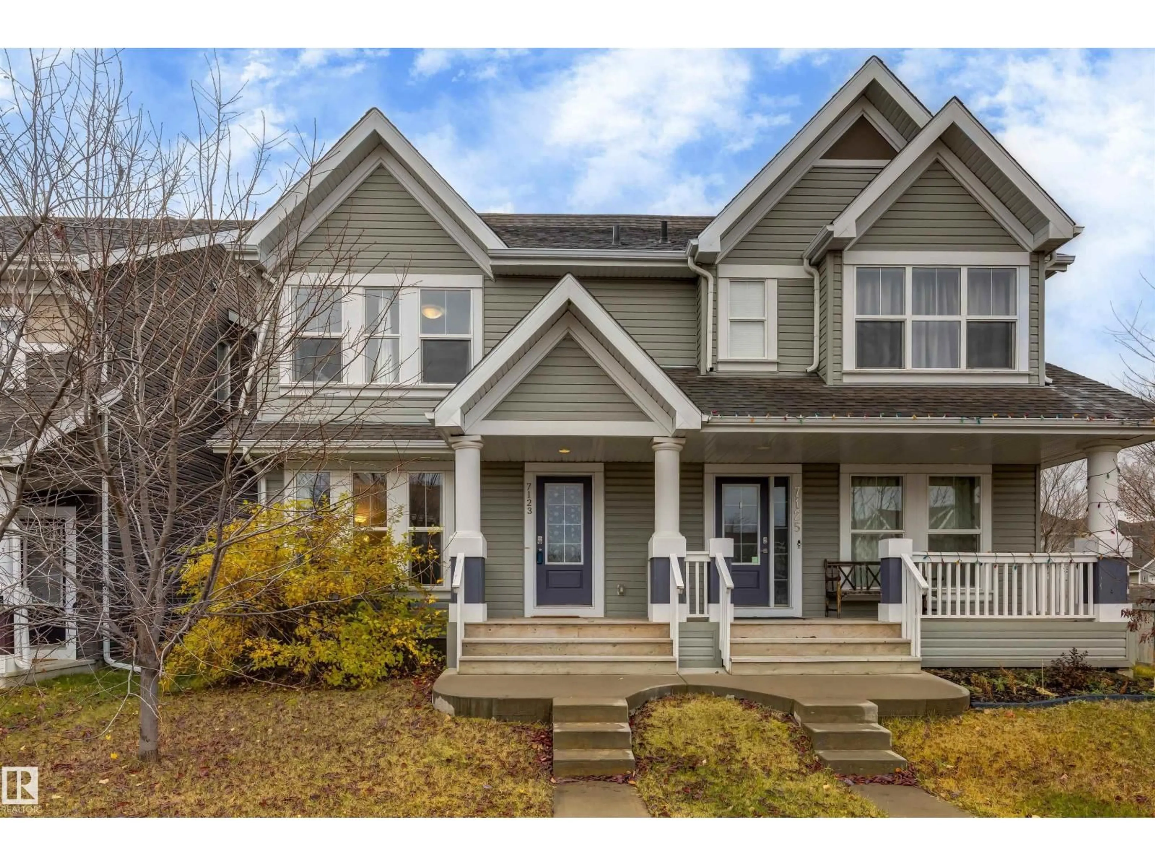 Home with vinyl exterior material, street for SW - 7123 22 AV, Edmonton Alberta T6X0S4